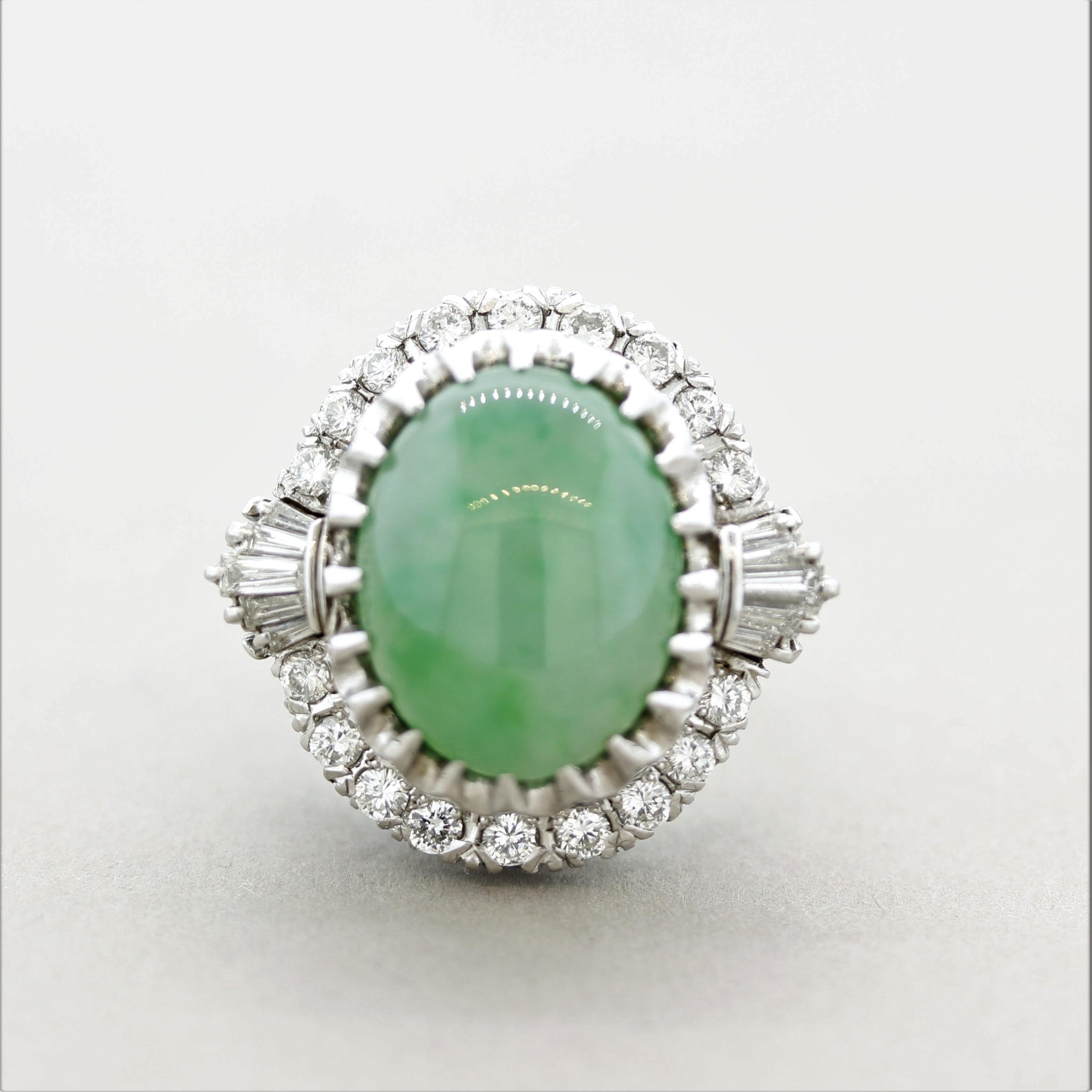 A sleek, sexy, and magnificently made natural jade cocktail ring! The jade has an incredible luster as light seems to roll across its surface. It has a unique mottled green color that calms you as you gaze at it. It is hand-fabricated in a classic
