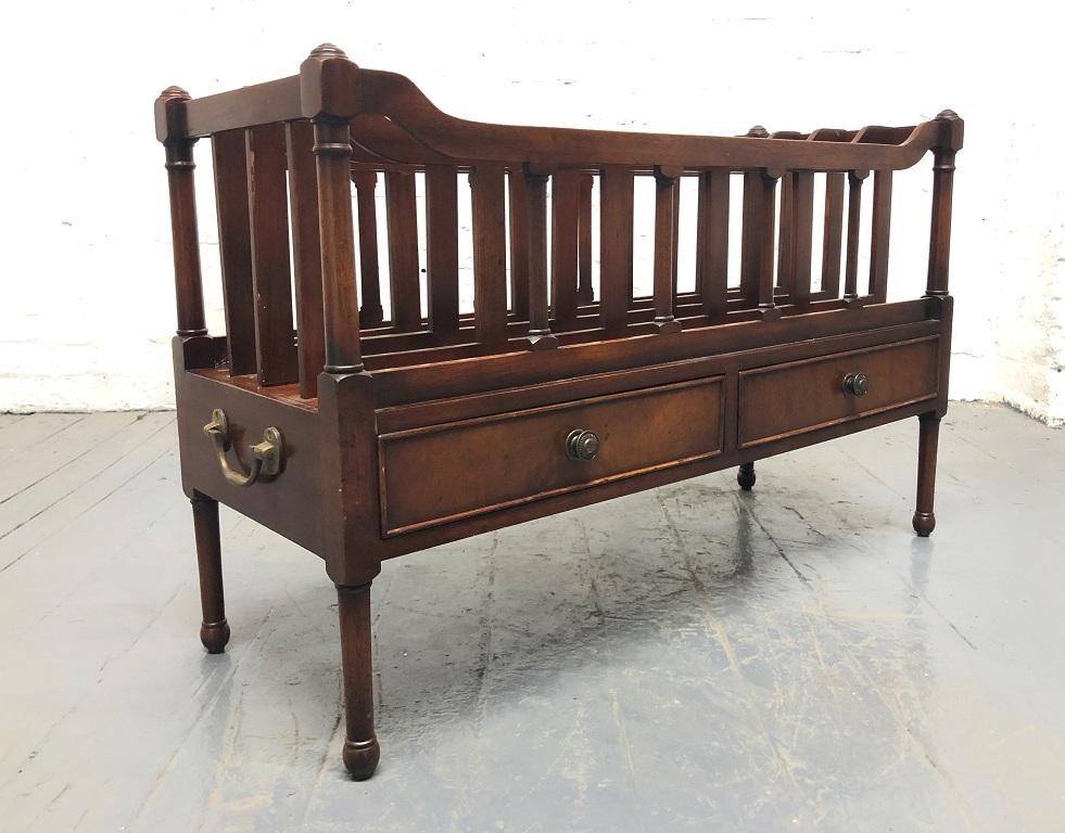 Antique style mahogany double Canterbury. The Canterbury has two pullout / pull-out drawers with two frieze drawers to the rear. Brass handles to the sides.