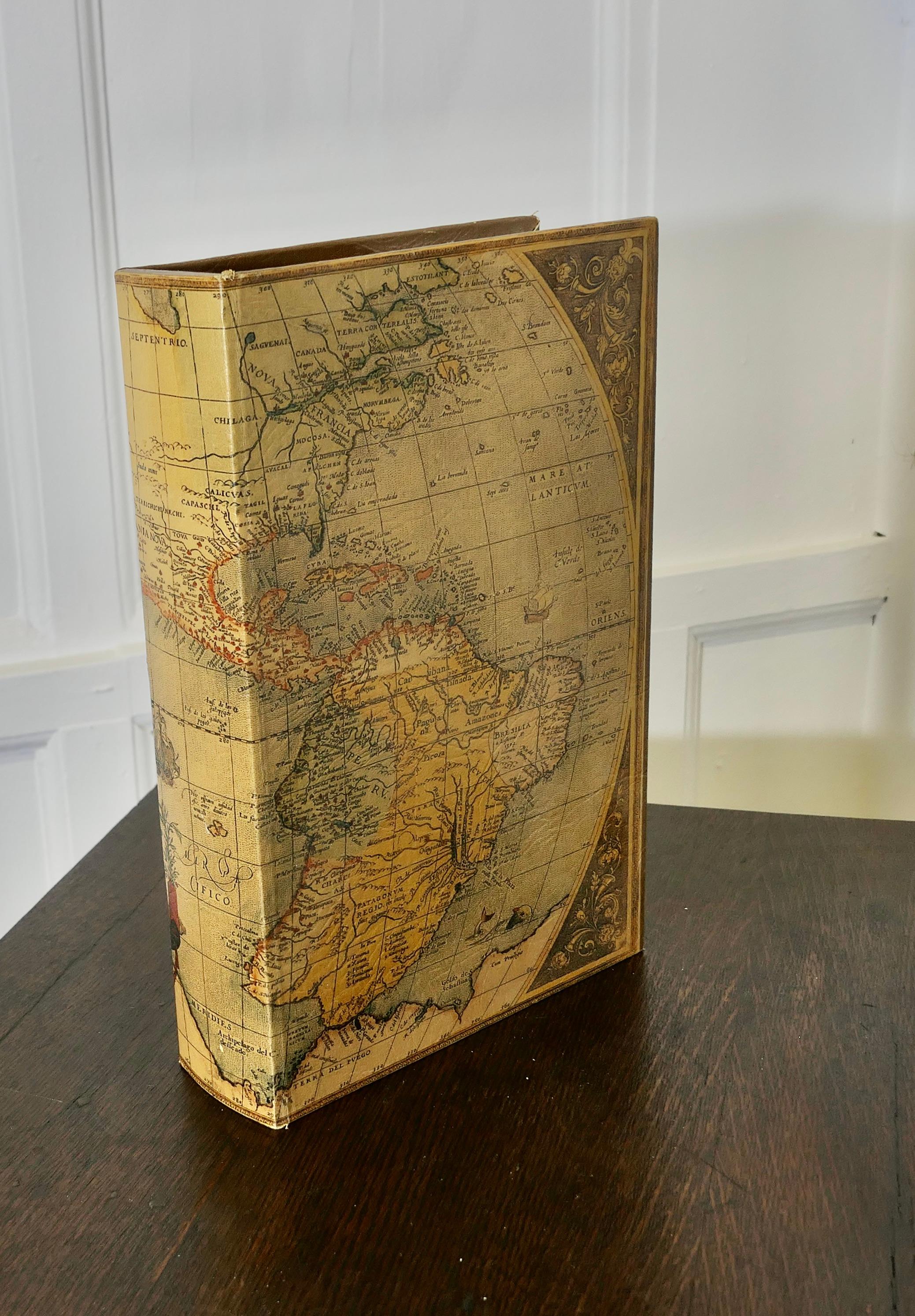 Antique Style Map Covered Secret Safe Book

This is a very attractive piece, it has an antique map print covering and inside is lined with leather
When set on the bookshelf this looks like a very attractive book, however when it is opened it reveals