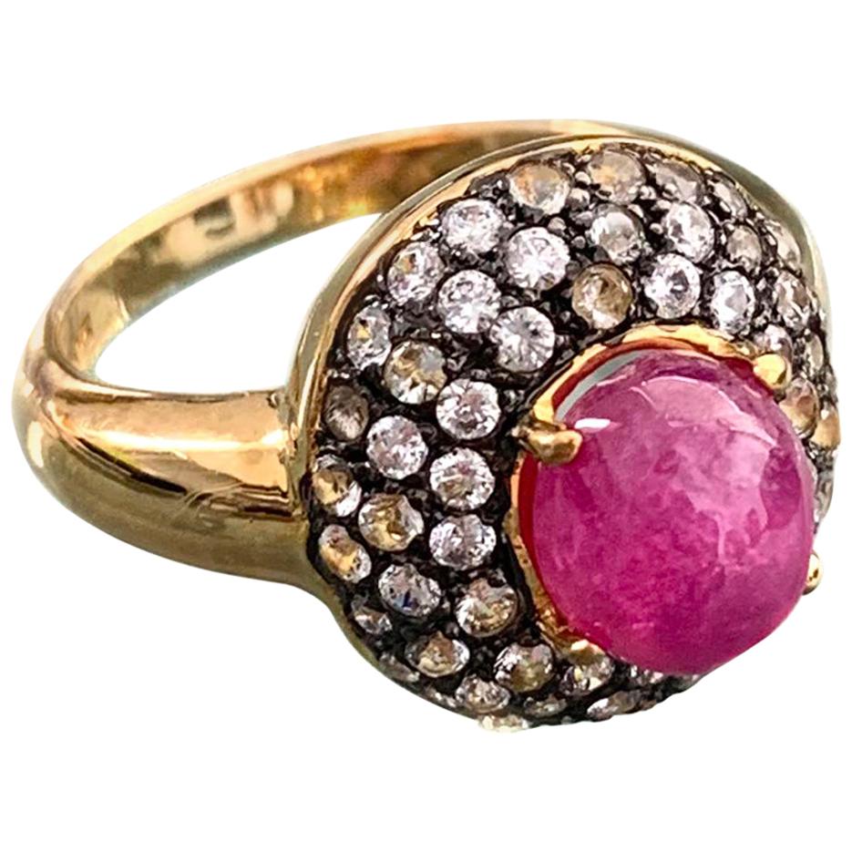 Antique-style Oval Ruby and White Topaz Bombe Cocktail Ring For Sale
