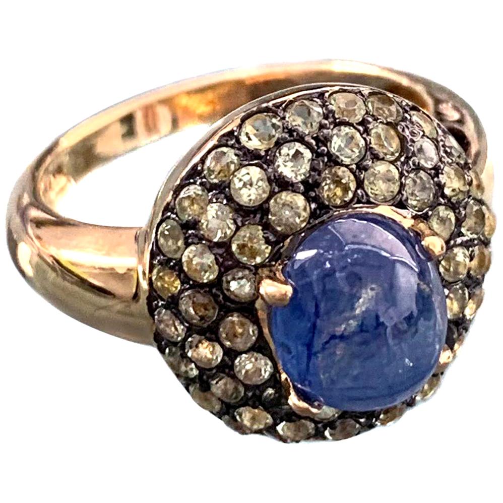 Antique-style Oval Sapphire and Peridot Bombe Cocktail Ring For Sale
