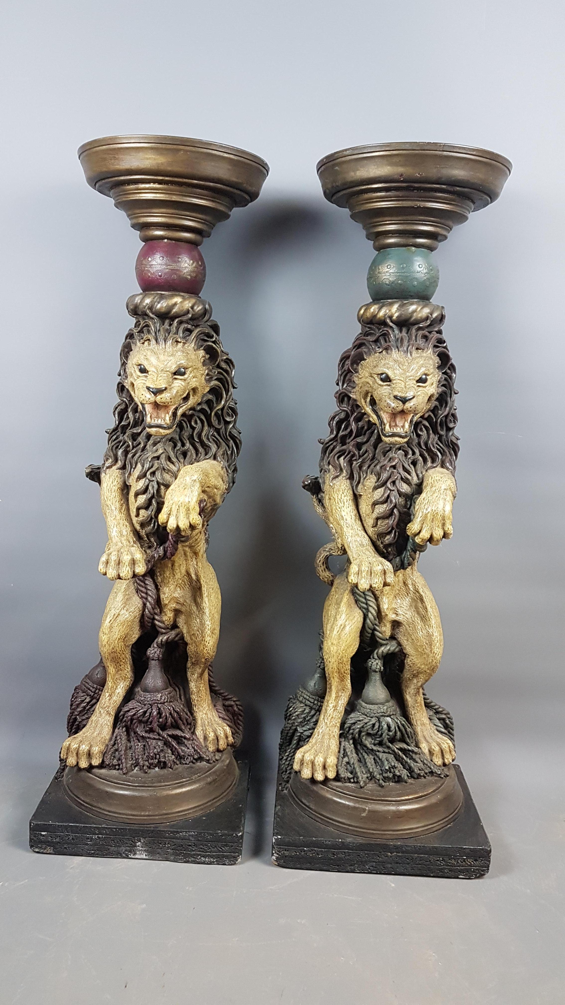 A superbly decorative pair of plaster/clay cast rampant lion hall stands/consoles that are painted. The casting quality of the these stands is exceptional. They are in very good condition with a few marks and knocks from use. Have previously been