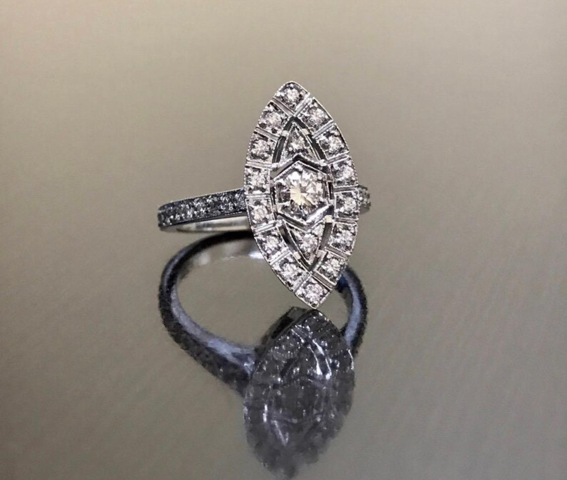 DeKara Designs Collection

Gorgeous Platinum Art Deco/Vintage Inspired Engagement Ring.

Metal- 90% Platinum, 10% Iridium.

Stone- 35 Round Diamonds F-G Color VS1 Clarity, 0.54-0.58 Carats.

This ring is a true beauty, and any woman would love it