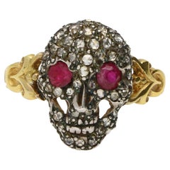 Antique Style Rose Cut Diamond and Ruby Skull Ring in 14k Yellow Gold and Silver