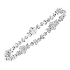 Antique-Style Round Diamond Flower Tennis Bracelet