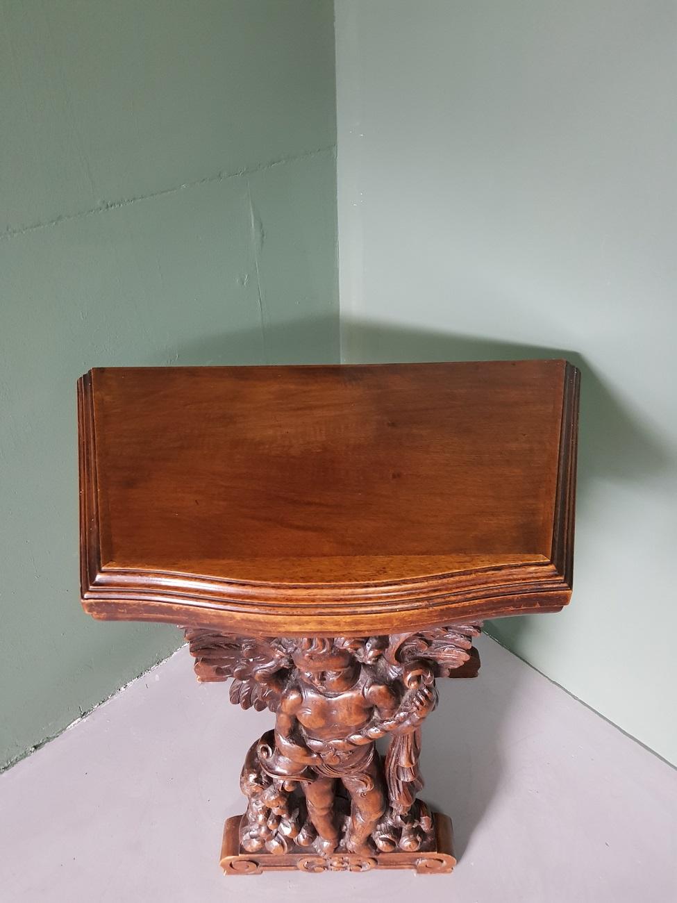 Renaissance Revival Antique style Small Hall Table with a Carved Angel