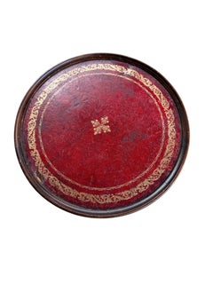 Antique-style tripod pedestal wine table featuring a circular red leather top