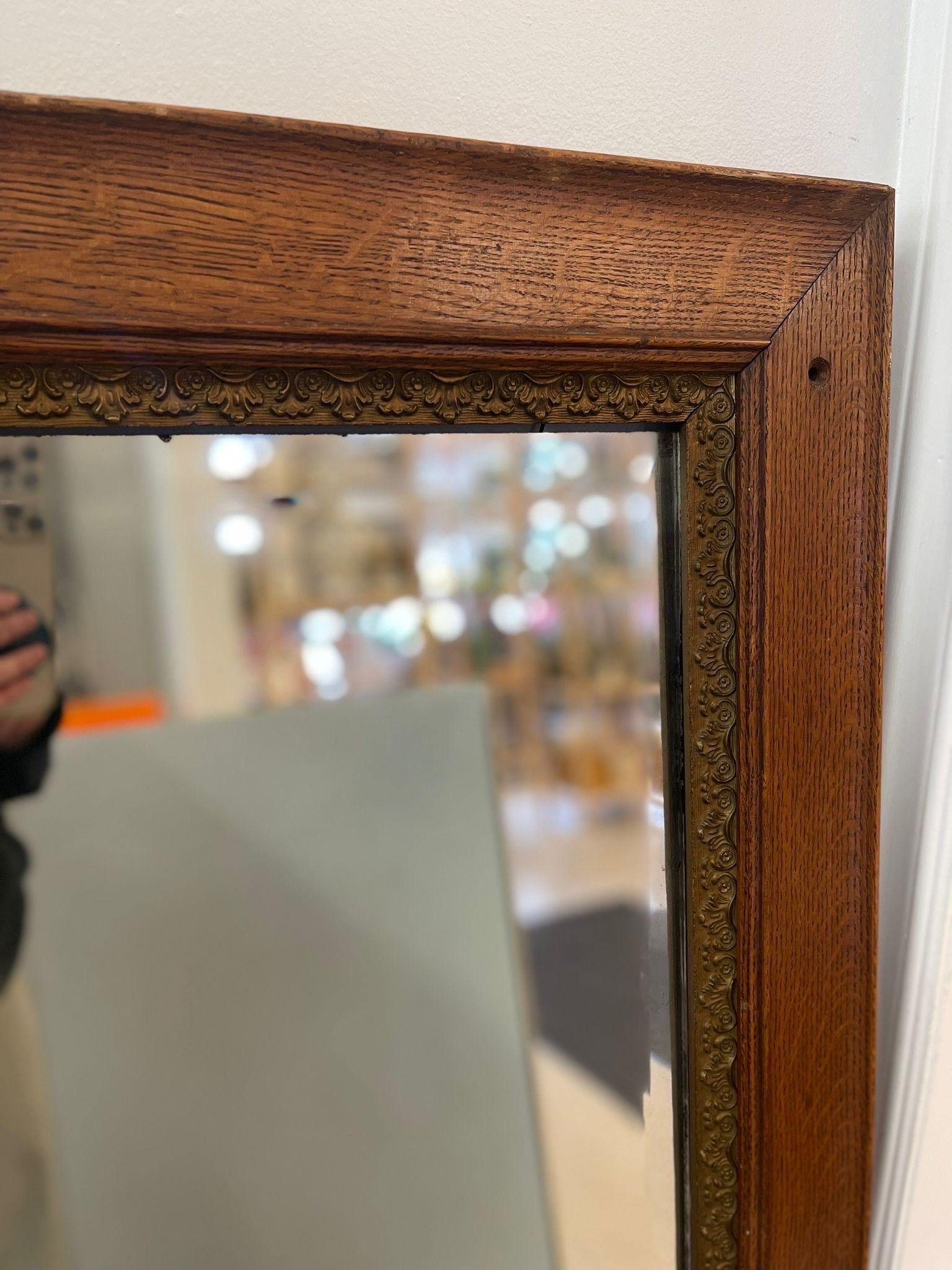 Late 20th Century Antique Style Wall Mirror With Ornate Golden Toned Banding Around the Frame. For Sale