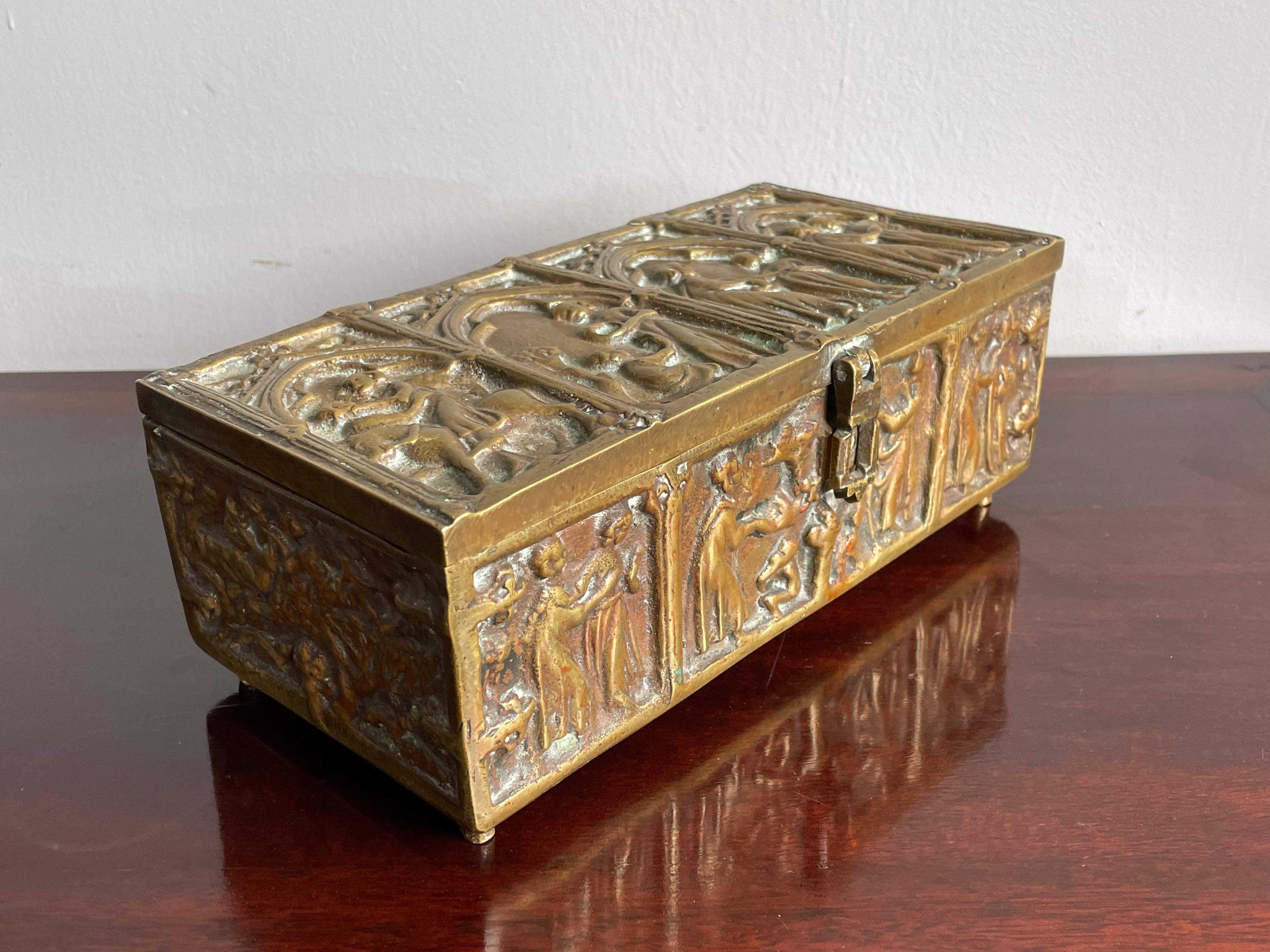 Wonderfully decorative, intricate and good condition, 19th century box.

Over the years we have sold a number of rare and unique boxes, but never a Gothic Revival one with as many bronze images (possibly biblical scenes) as this specimen here.