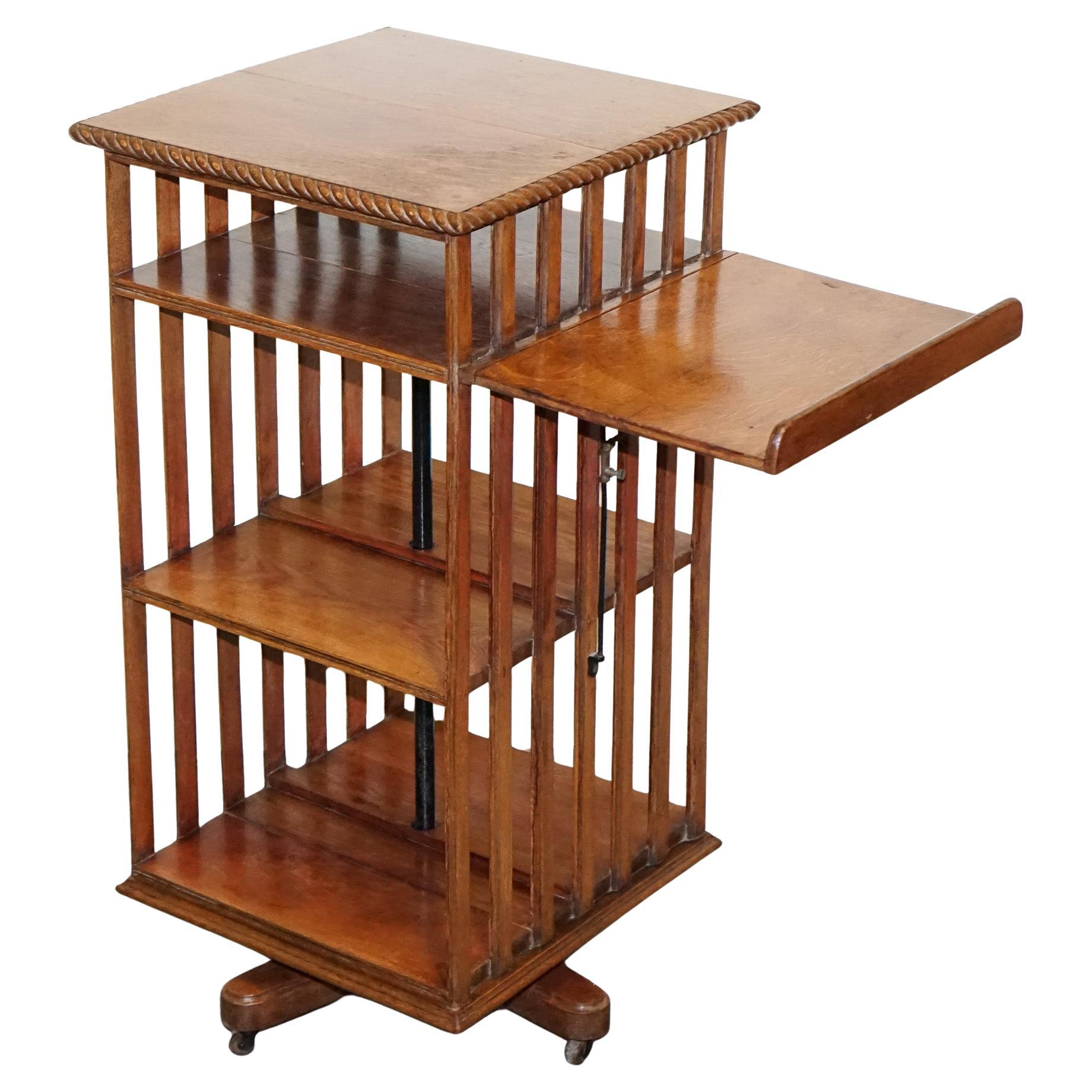 ANTIQUE SUBSTANTIAL OAK REVOLVING BOOKCASE WITH FOLDING READiNG STAND For Sale