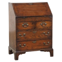 Antique subtle English secretary from the 19th century with a beautiful interior