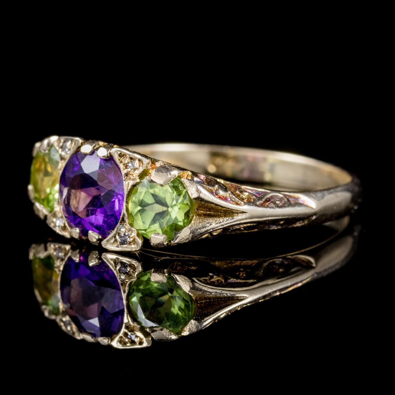 A lovely antique Victorian Suffragette ring adorned with a 0.75ct violet Amethyst, two 0.25ct green Peridots and four small Diamonds.

Suffragettes liked to be depicted as feminine, their jewellery popularly consisted of Violet, Green and White