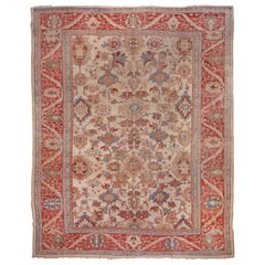 Antiker Sultanabad-Teppich im All-Over- Field-Stil, cremefarbenes Feld, helles Rot und blaue Bordüren