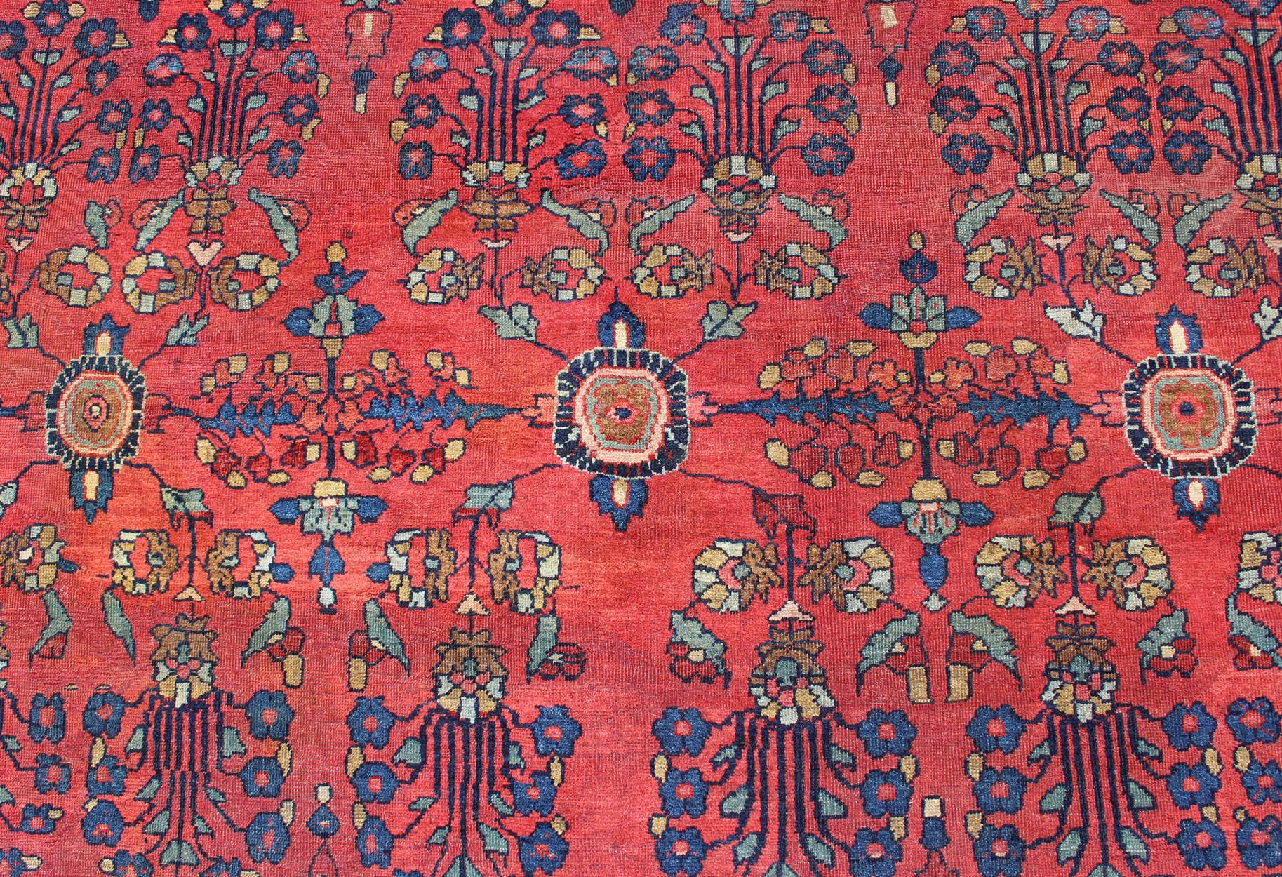 20th Century Antique Sultanabad Carpet with All-Over Large Scale Flower Design With Red Field For Sale