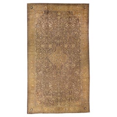Antiker antiker handgefertigter brauner Oversize-Wollteppich mit Allover-Motiv von Sultanabad