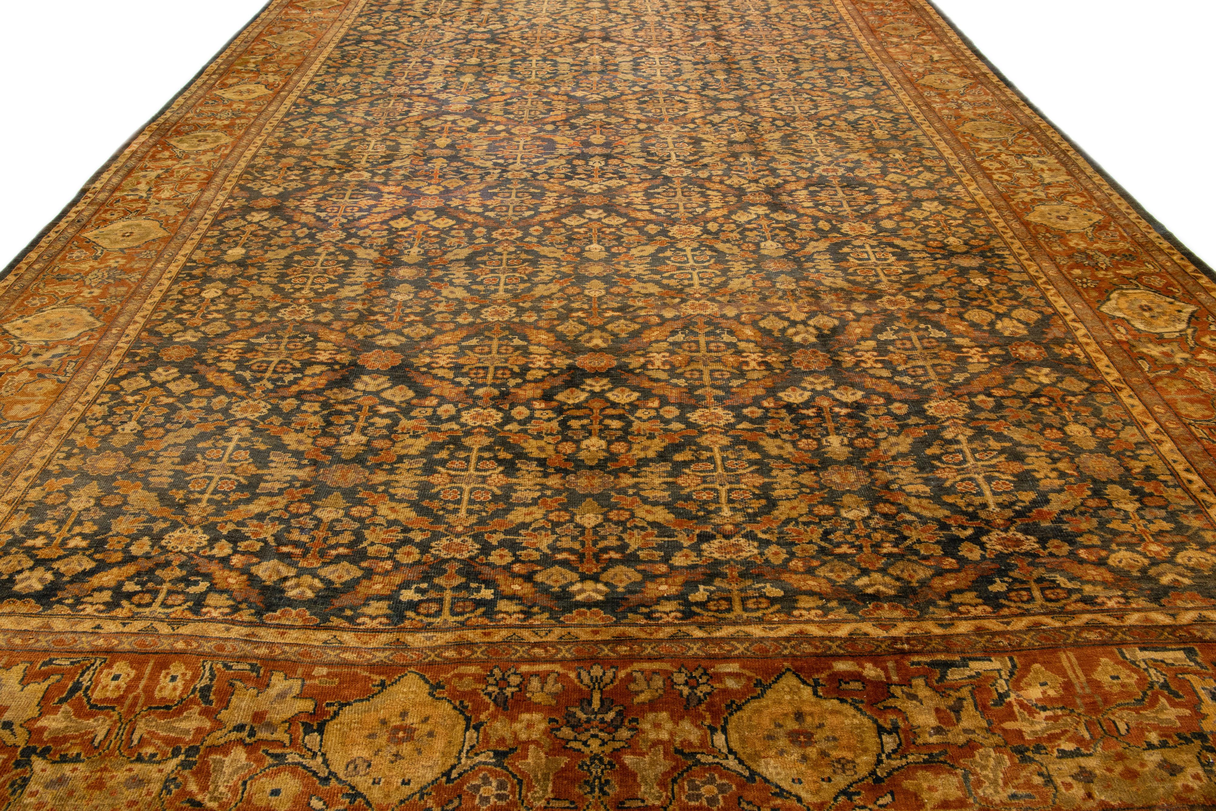 Islamic Antique Sultanabad Handmade Blue & Rust Wool Rug with Allover Floral Pattern For Sale