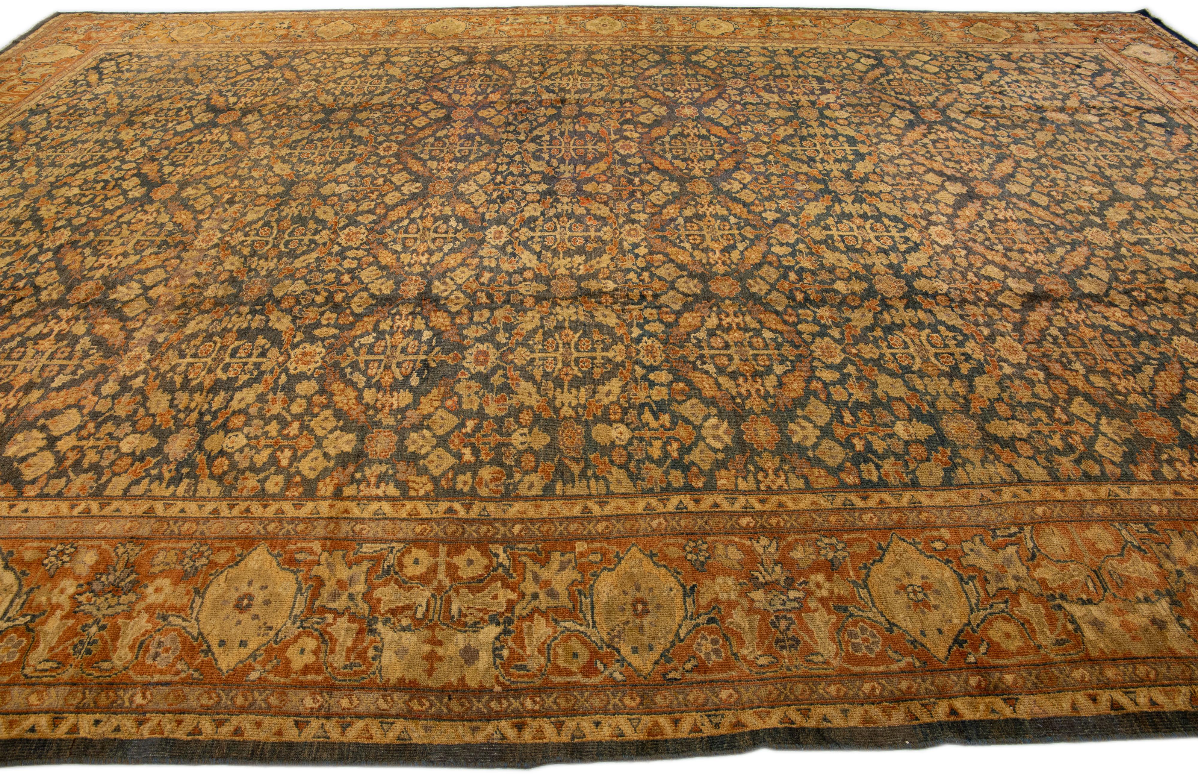 Hand-Knotted Antique Sultanabad Handmade Blue & Rust Wool Rug with Allover Floral Pattern For Sale
