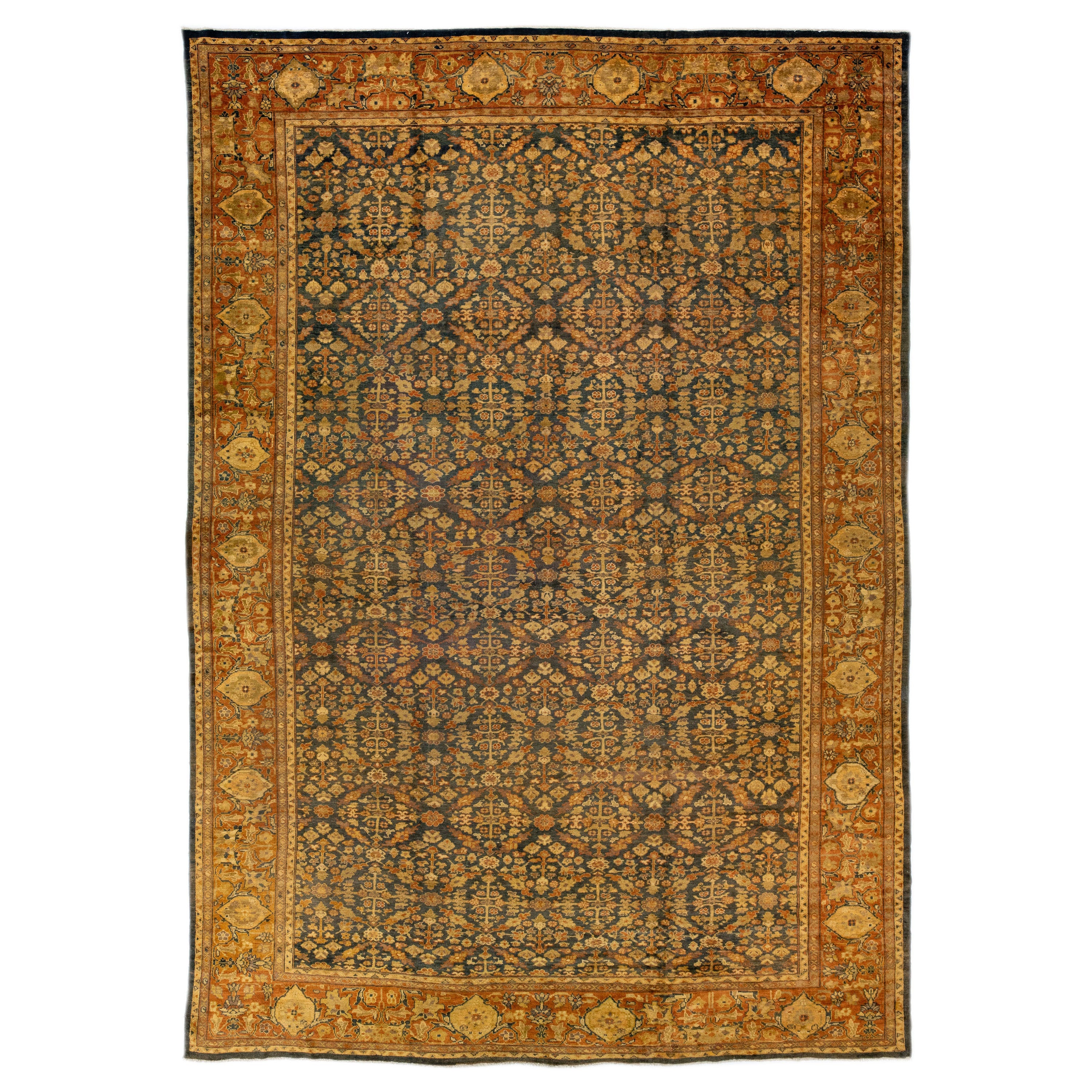 Antiker handgefertigter antiker Sultanabad-Wollteppich in Blau und Rost mit Allover-Blumenmuster