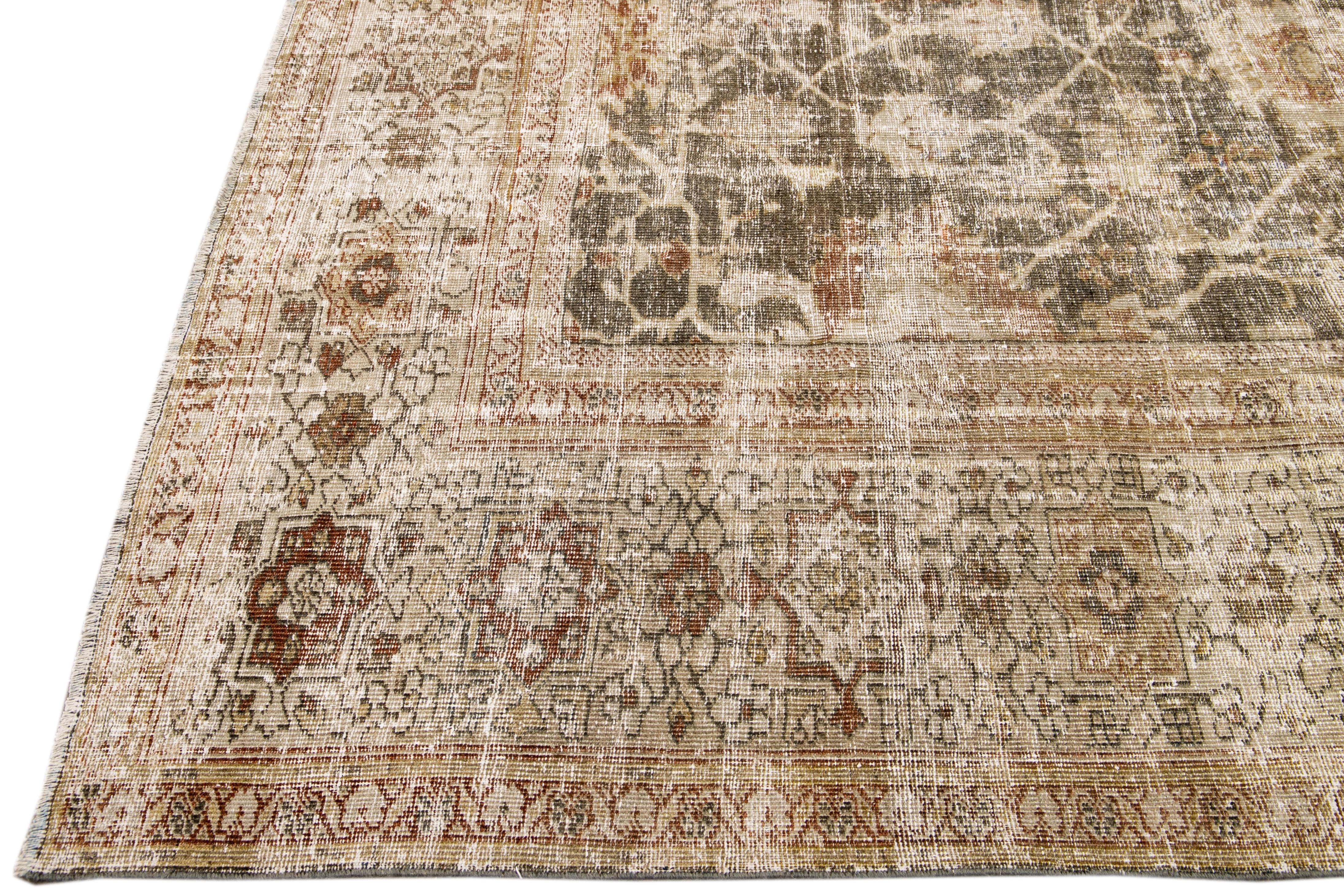 Persian Antique Sultanabad Handmade Floral Blue and Brown Distressed Wool Rug For Sale