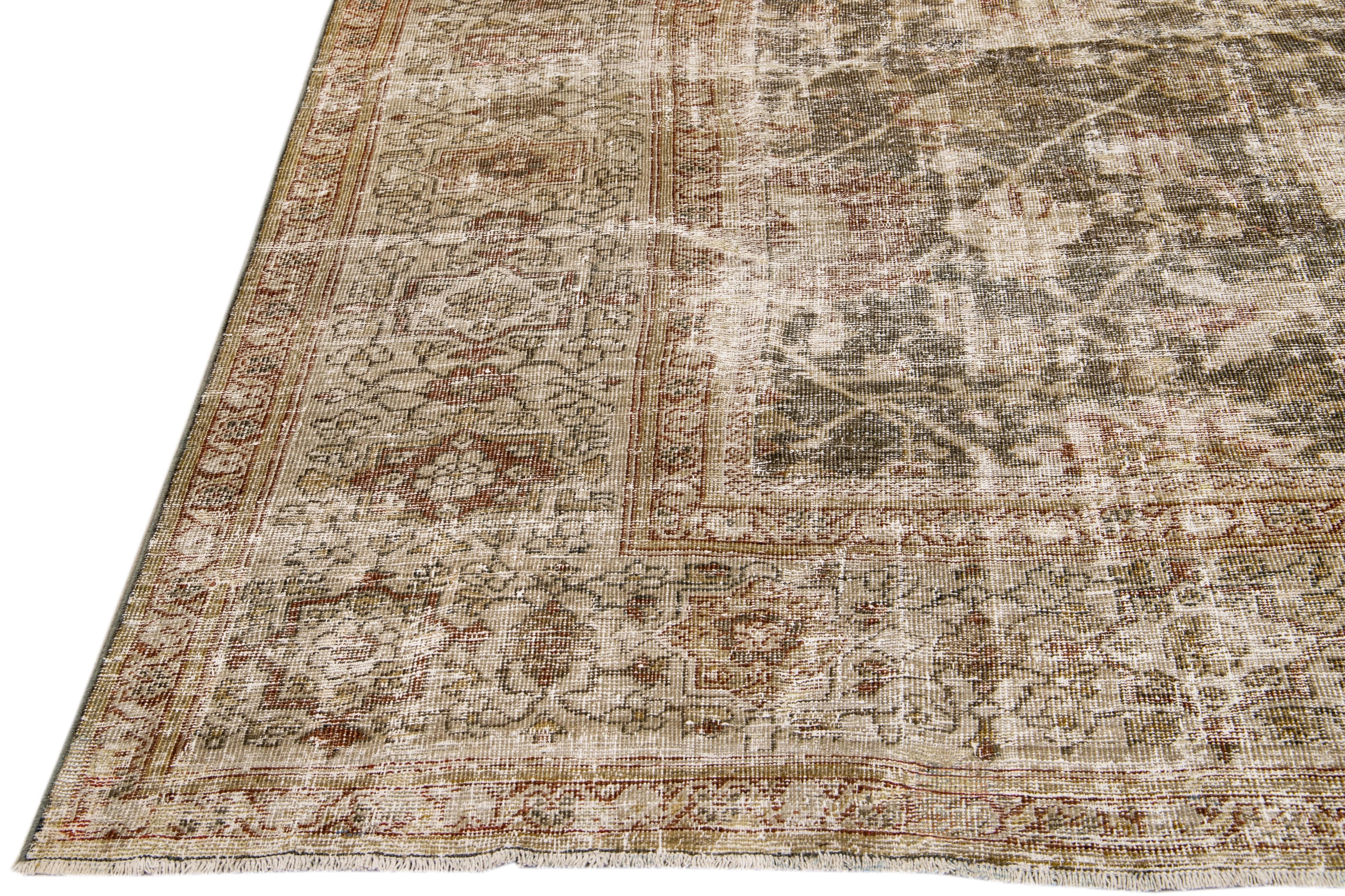 Antique Sultanabad Handmade Floral Blue and Brown Distressed Wool Rug For Sale 1