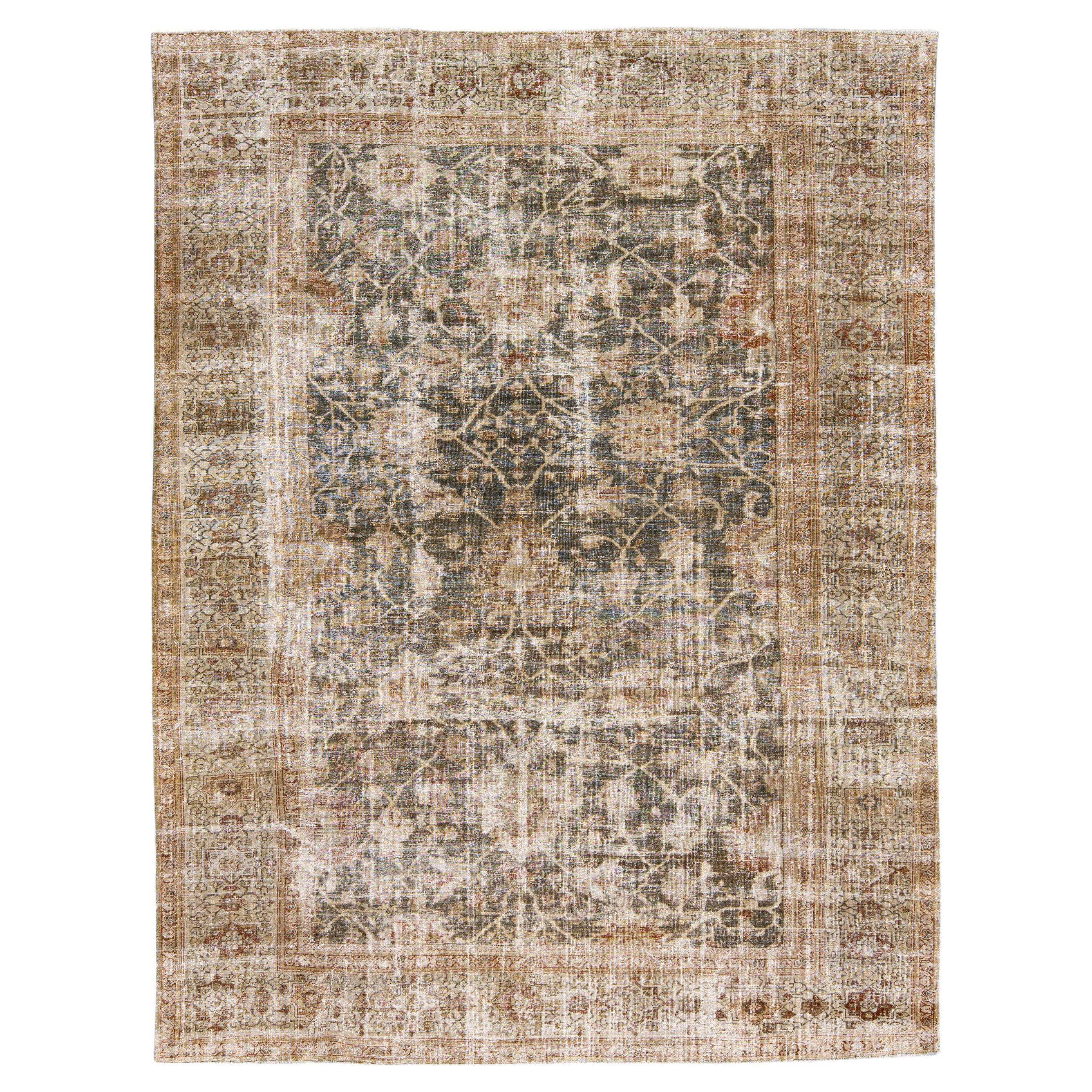 Antique Sultanabad Handmade Floral Blue and Brown Distressed Wool Rug For Sale