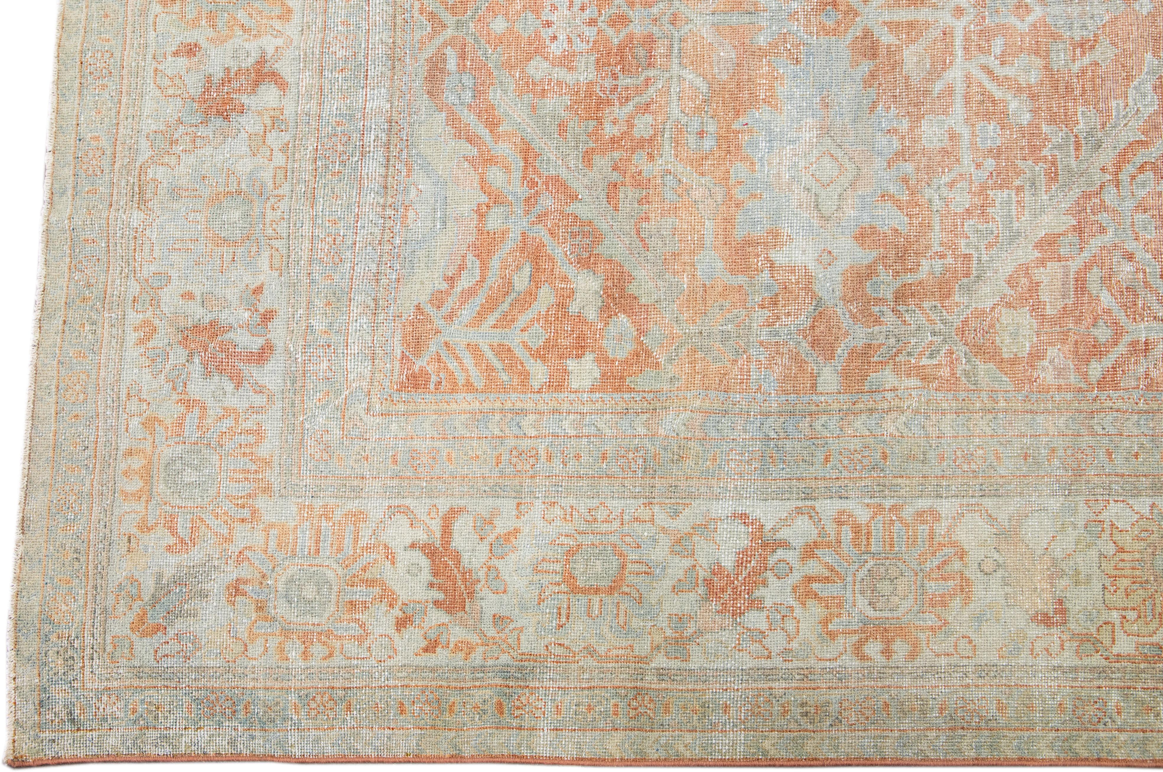 Alfombra antigua de lana naranja con motivos florales hecha a mano en Sultanabad Rugs Persa en venta