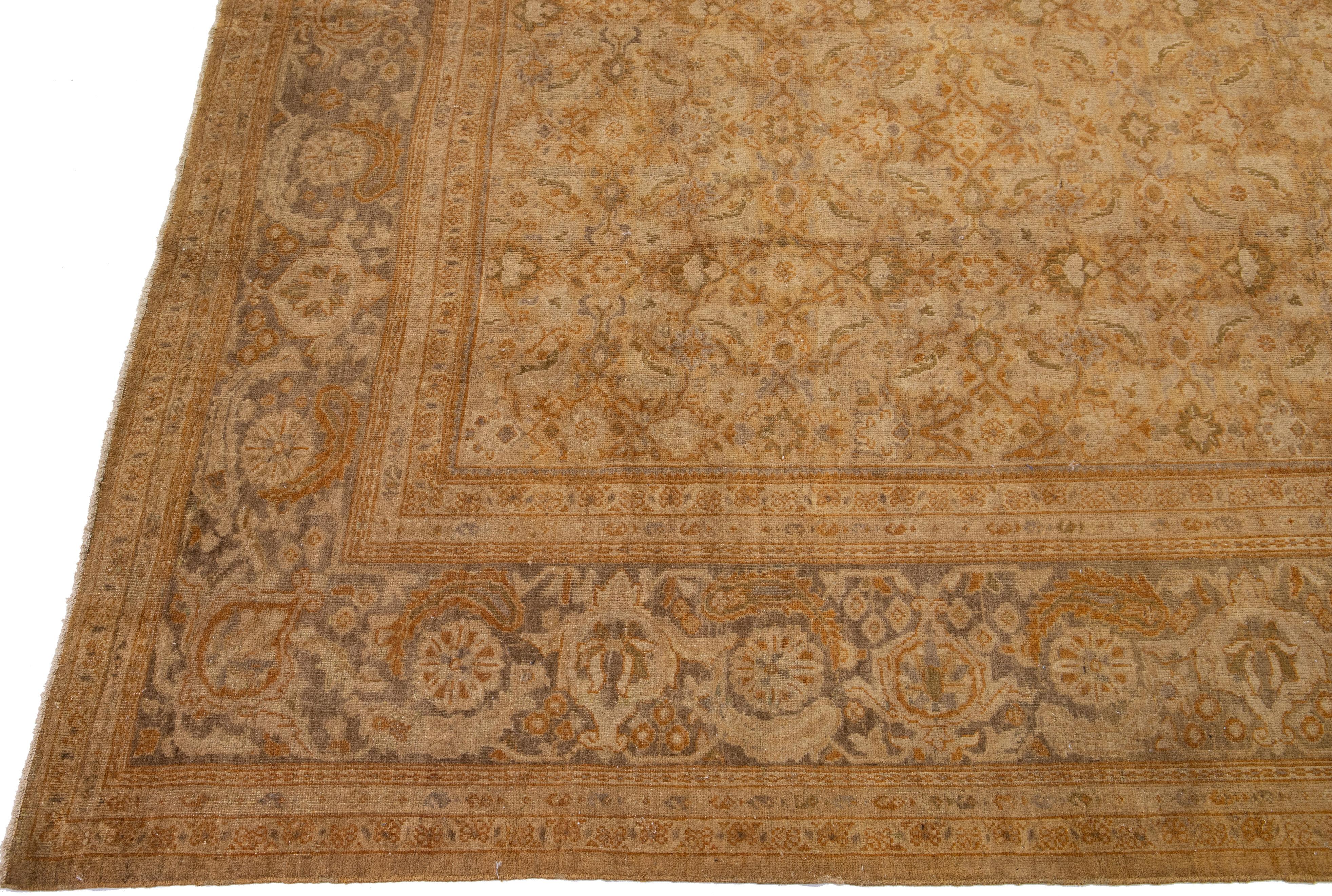 Persian Antique Sultanabad Handmade Tan Wool Rug with Allover Floral Design For Sale