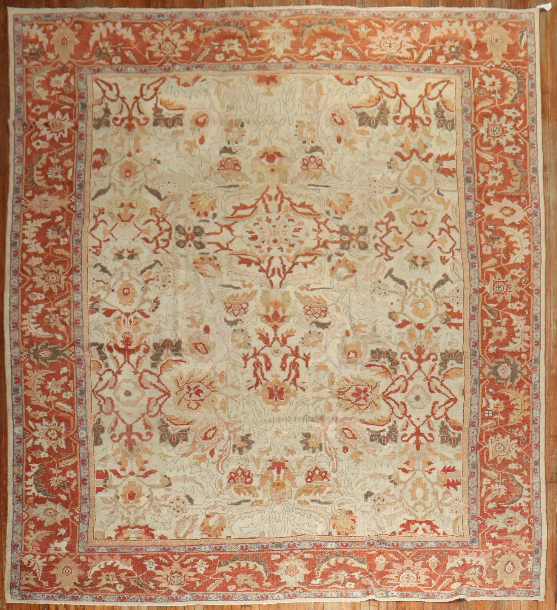 A connoisseur caliber late 19th century Persian Sultanabad carpet.

Measures: 11' x 13'6''

Woven in a series of villages in Western Central Iran, Sultanabad carpets employ over-scale, spacious all-over patterns that are highly prized for their