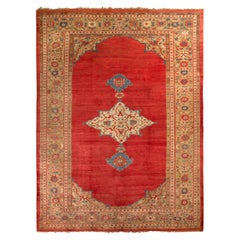 Tapis persan ancien de Sultanabad à motif de médaillon rouge et beige