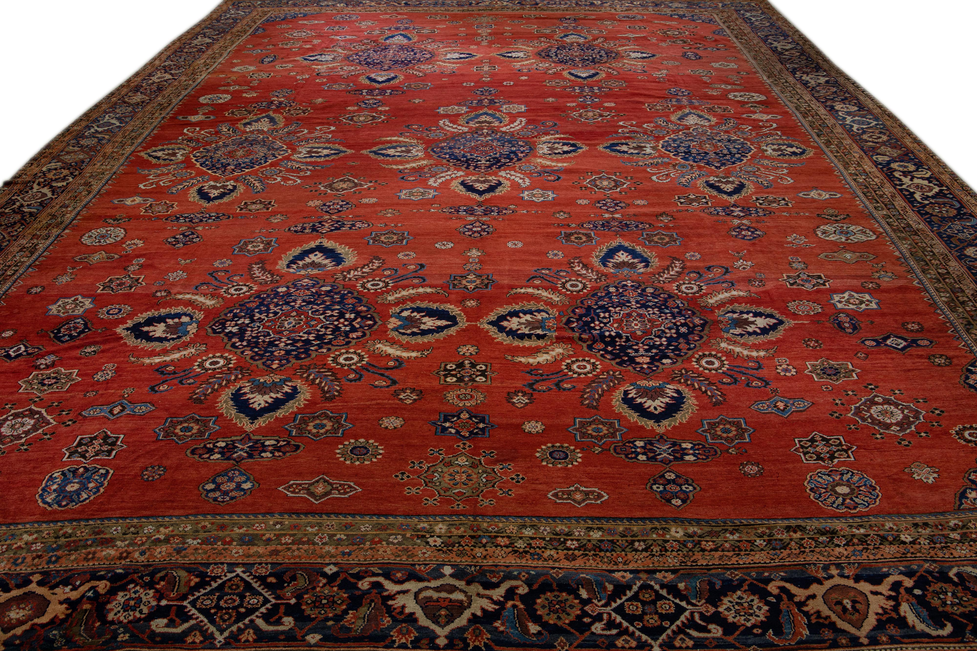 Perse Tapis ancien en laine persane Sultanabad rouge à motifs floraux faits à la main en vente