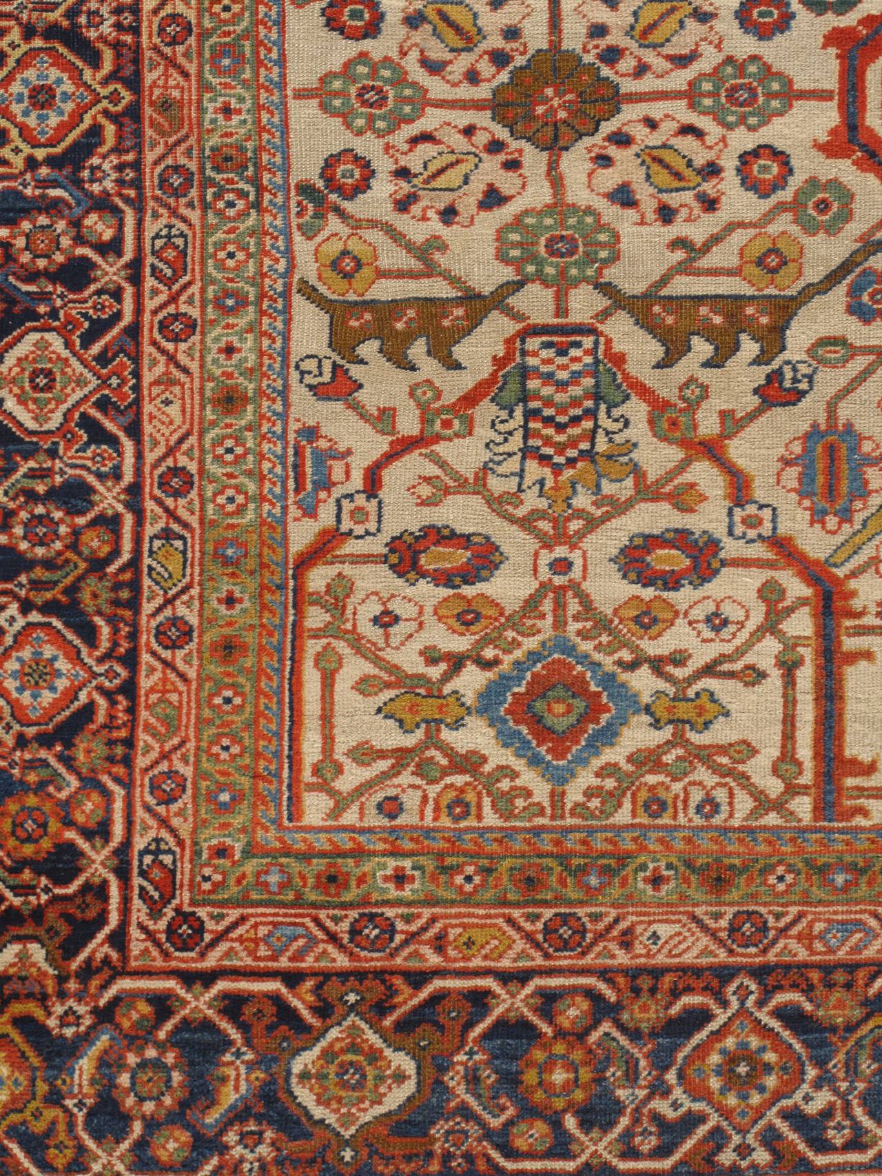 Antique Sultanabad rug carpet, circa 1890. This is a most attractive Sultanabad carpet from northwest Persia with a currently highly desirable ivory field. The pattern is a double layer lattice with palmettes, rosettes, stiff hooked leaves and tiny