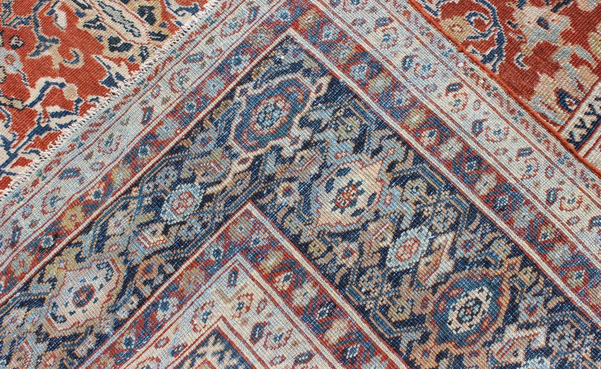 Wool Antique Sultanabad Rug with Large Flower Design in Soft Red Field & Multi Colors For Sale