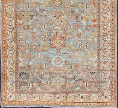 Antique Persian Sultanabad Rug With A Soft Sky Blue Field with Stylized Palmette