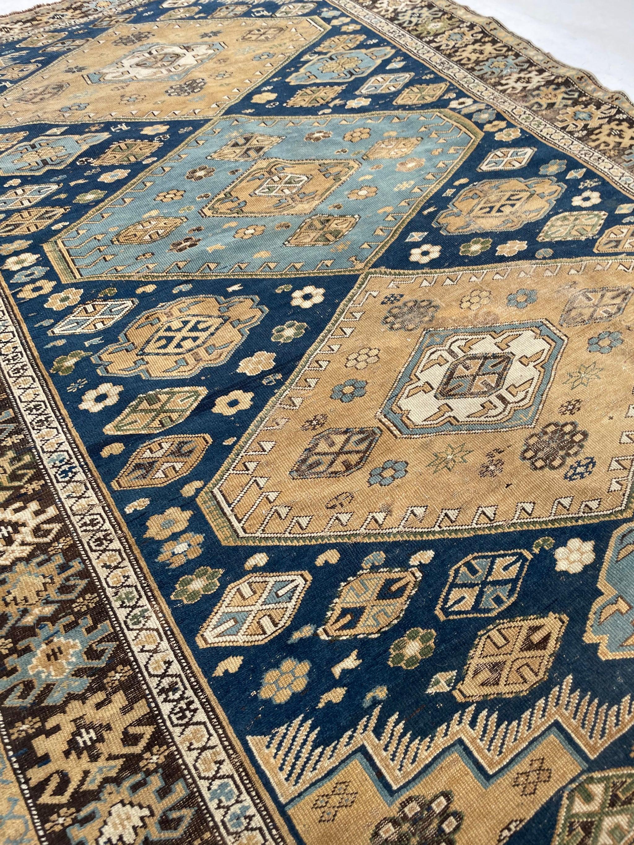 Super Fine Antique Caucasian Rug  Denim & Sky Blue With Espresso And Golden Wheat 

About: Lots of earthy hues with sensational blue dyes derived from the indigo plant and some of the yellowish-browns look like the color of a golden pear-leaf