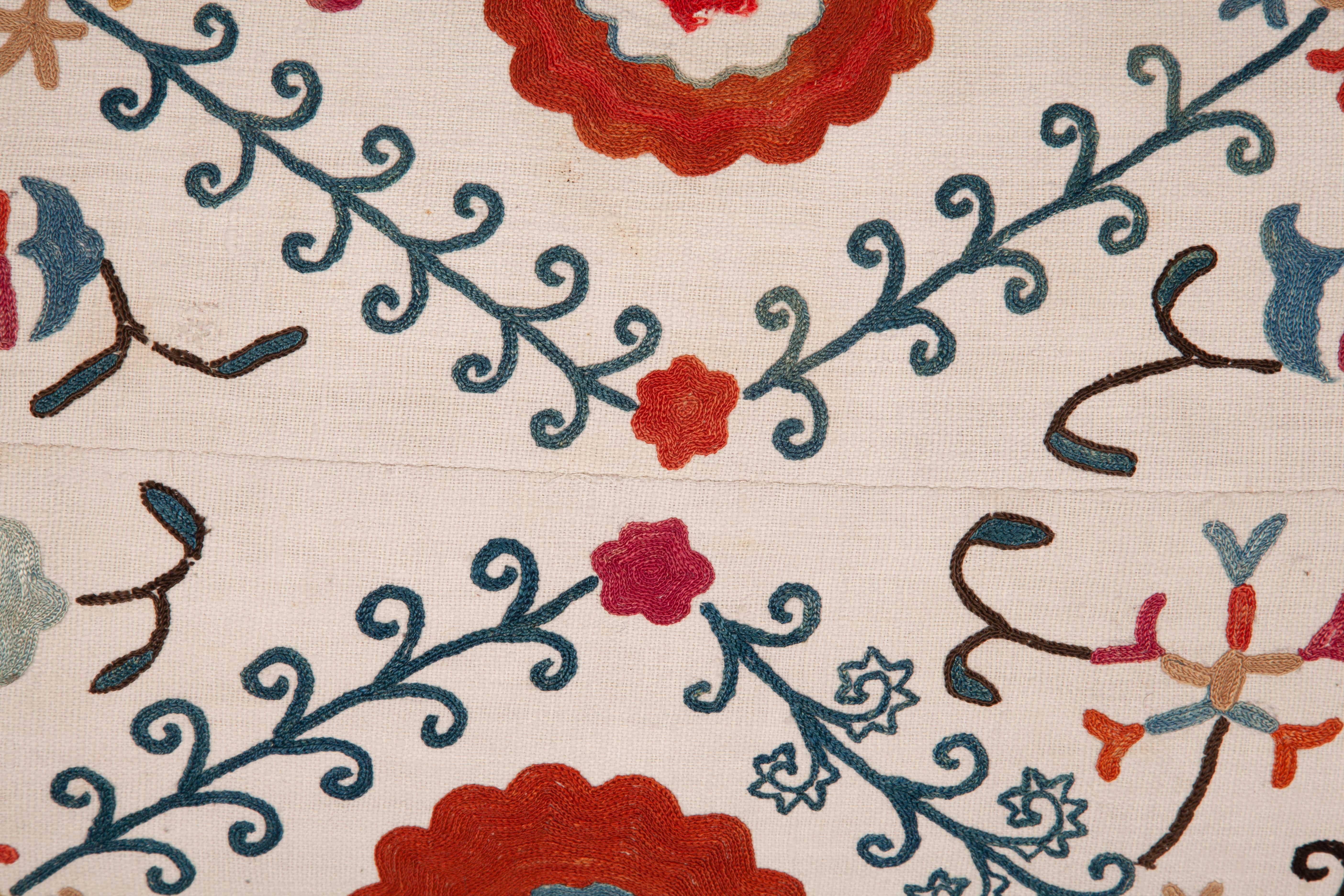 Uzbek Antique Suzani pillow Cases Fashioned from a Bukhara Suzani Fragment