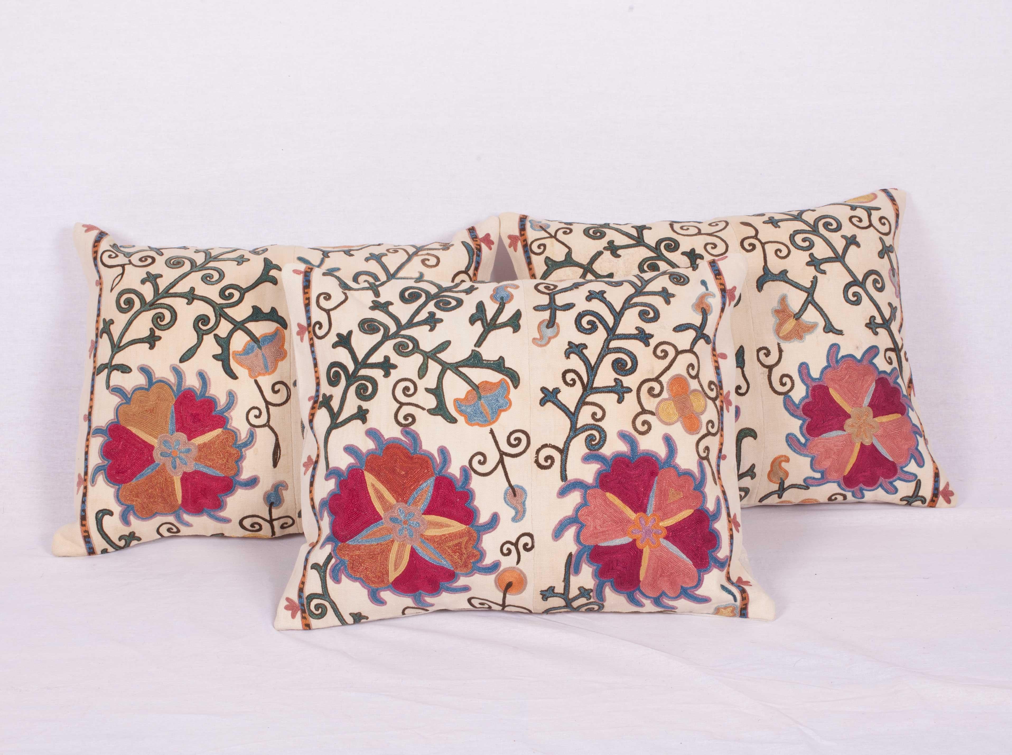 The pillow cases are made from an antique Uzbek Suzani from Bukhara. It is silk embroidery on a handwoven cotton field. The backing is pure linen, and they do not come with inserts but bags made to the size in cotton to accommodate insert materials.