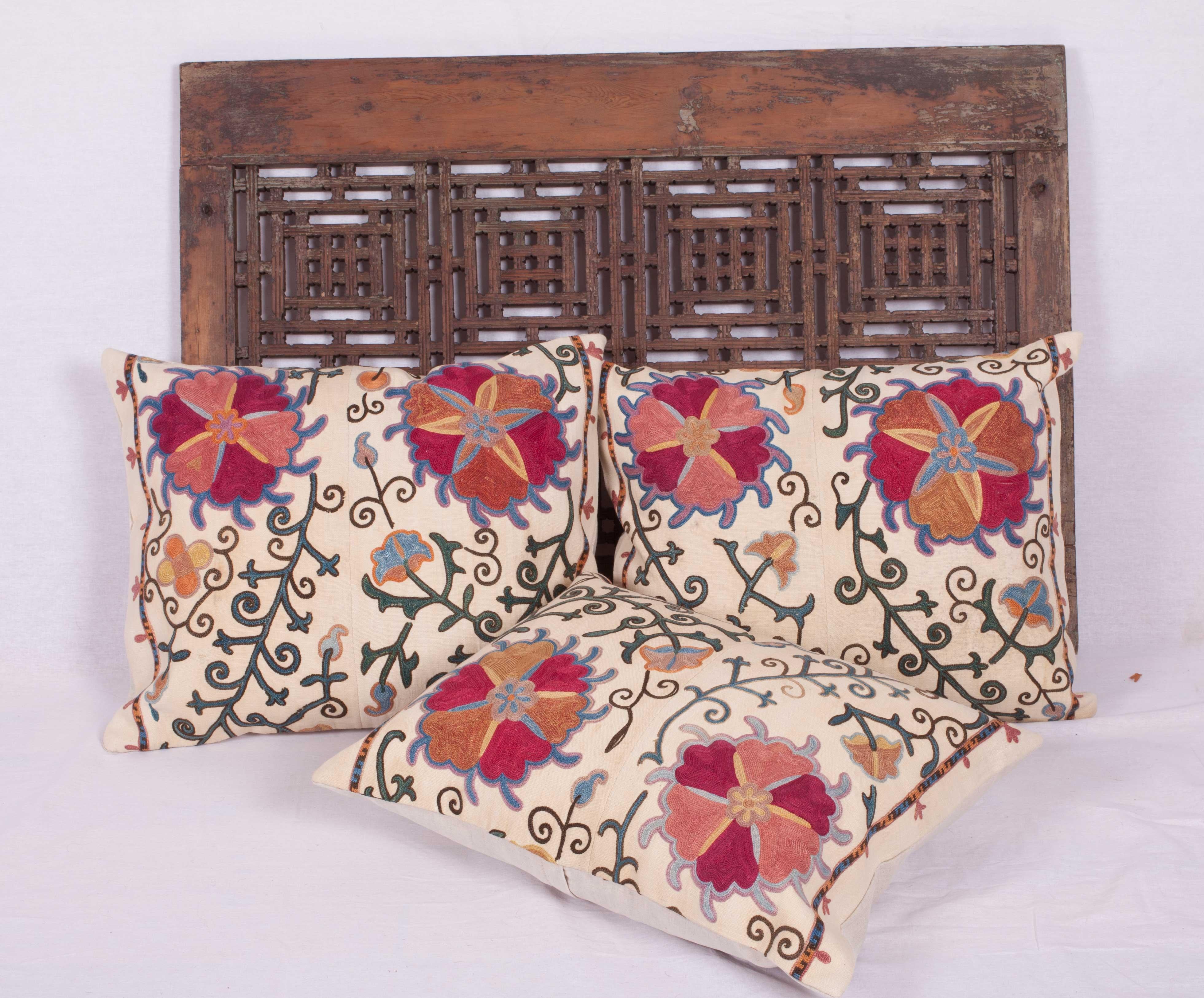 Embroidered Antique Suzani Pillow Cases Fashioned from a 19th Century Uzbek Bukhara Suzani
