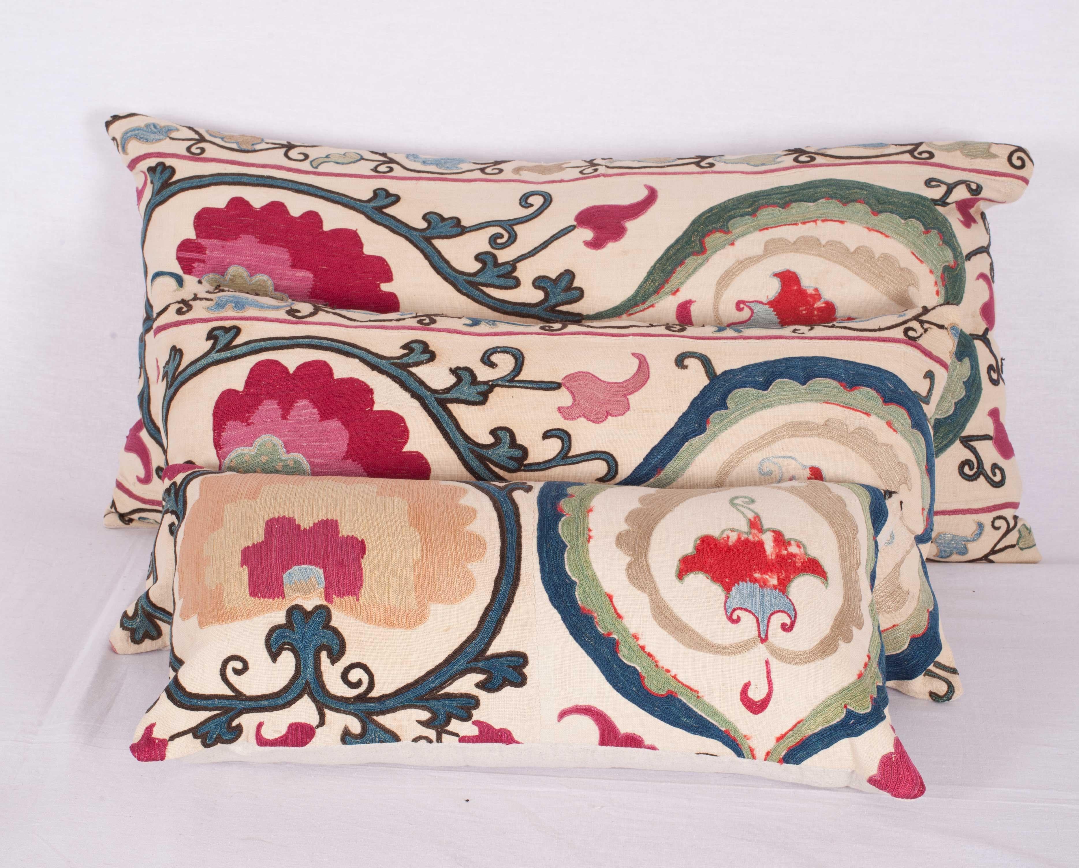 The pillow cases are made from an antique Uzbek Suzani from Bukhara. It is silk embroidery on a handwoven cotton field. The backing is pure linen, and they do not come with inserts but bags made to the size in cotton to accommodate insert materials.