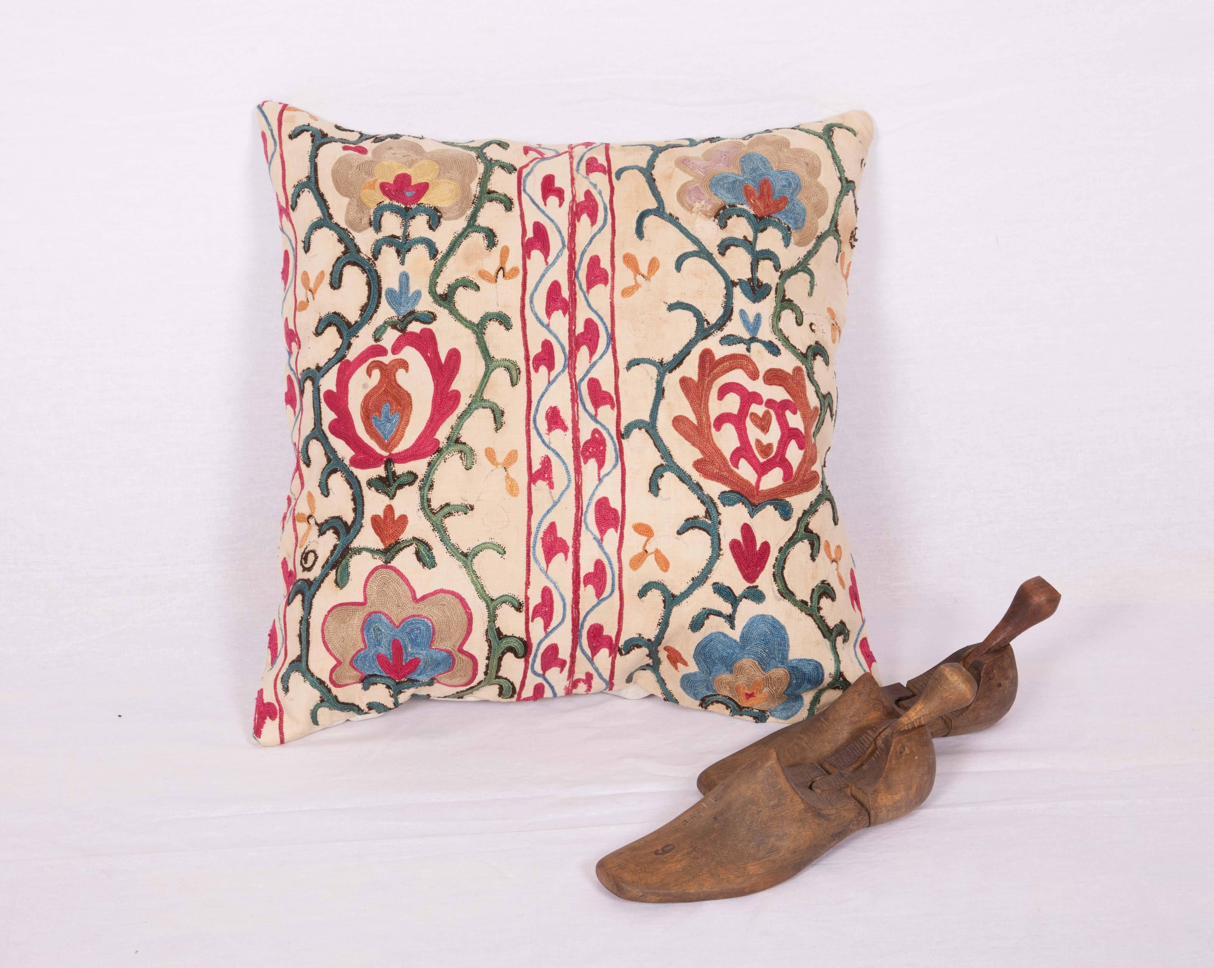 The pillow cases made from an antique Uzbek Suzani from Bukhara. It is silk embroidery on a handwoven cotton field. The backing is pure linen, and they do not come with inserts but bags made to the size in cotton to accommodate insert materials. Dry