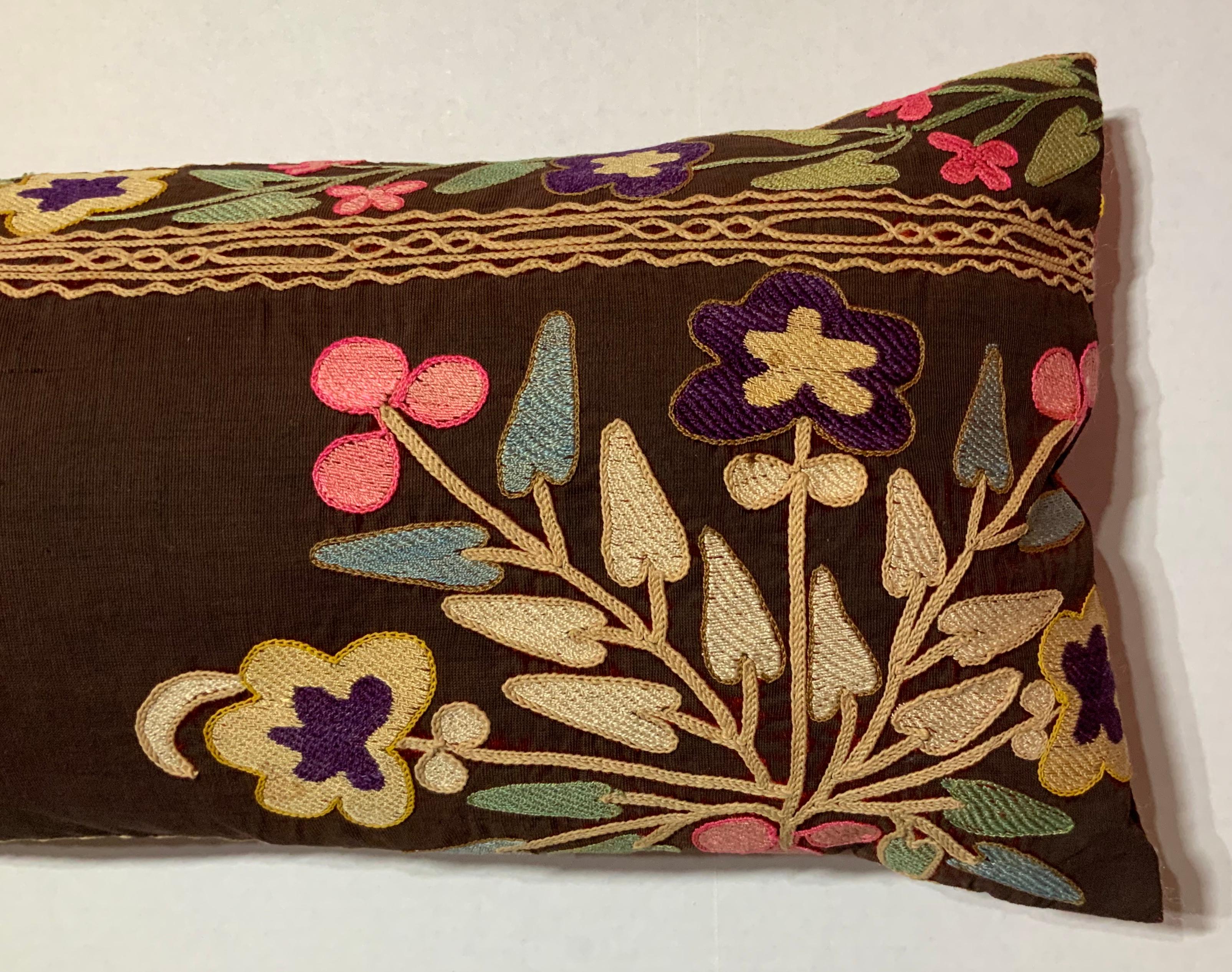 Exceptional pillow made of antique hand embroidery Suzani fragment, beautiful colors of vine and floral motifs all embroidered on an antique oxidized wine color velvet. Quality backing, frash inserts. Great for room decoration.
            