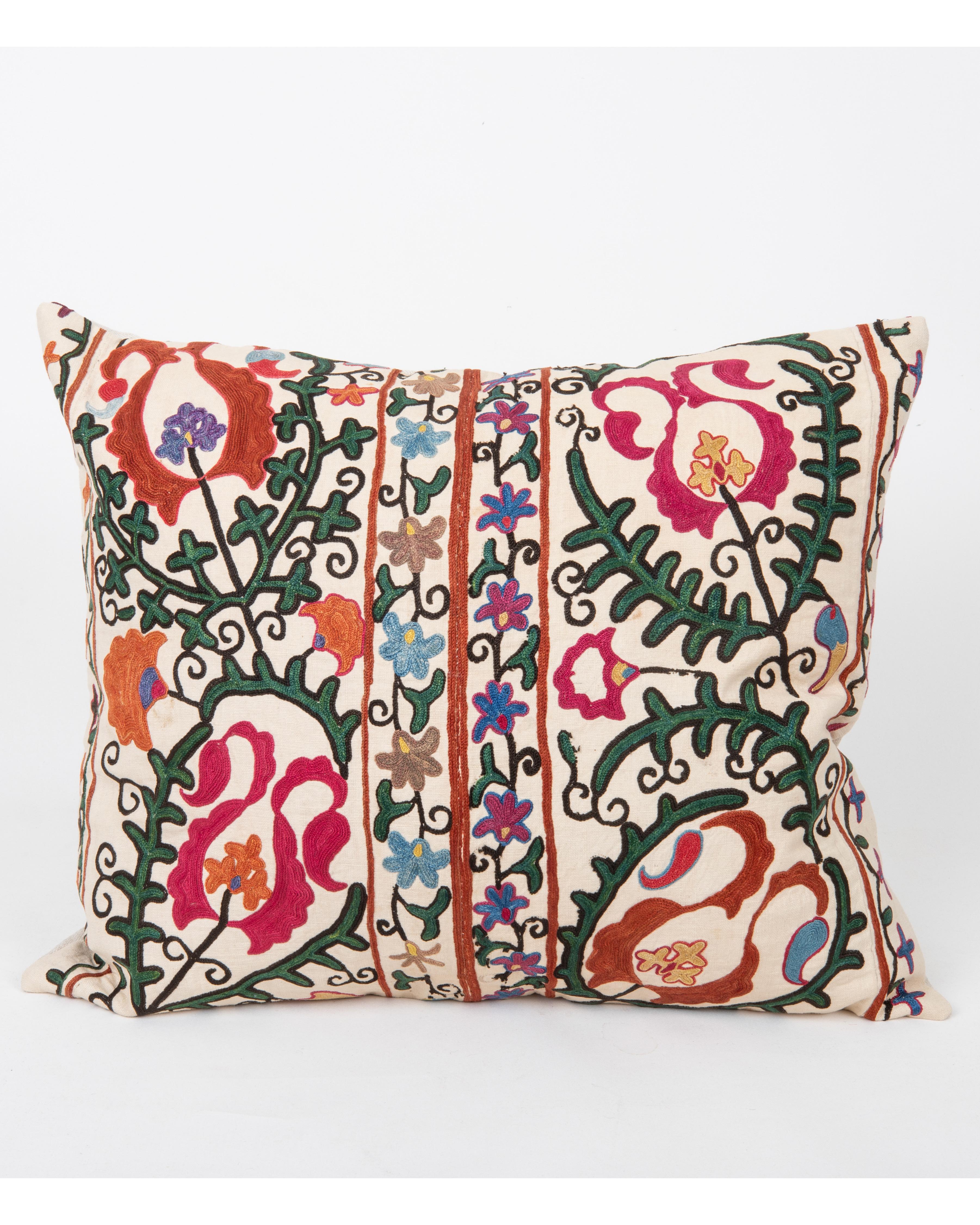 It does not come with an insert.
Linen in the back.
Zipper Closure.
Dry Cleaning recommended.



This  pillow is fashioned from a late 19th -century suzani originating from Bukhara, Uzbekistan—an important Silk Road city celebrated for its masterful