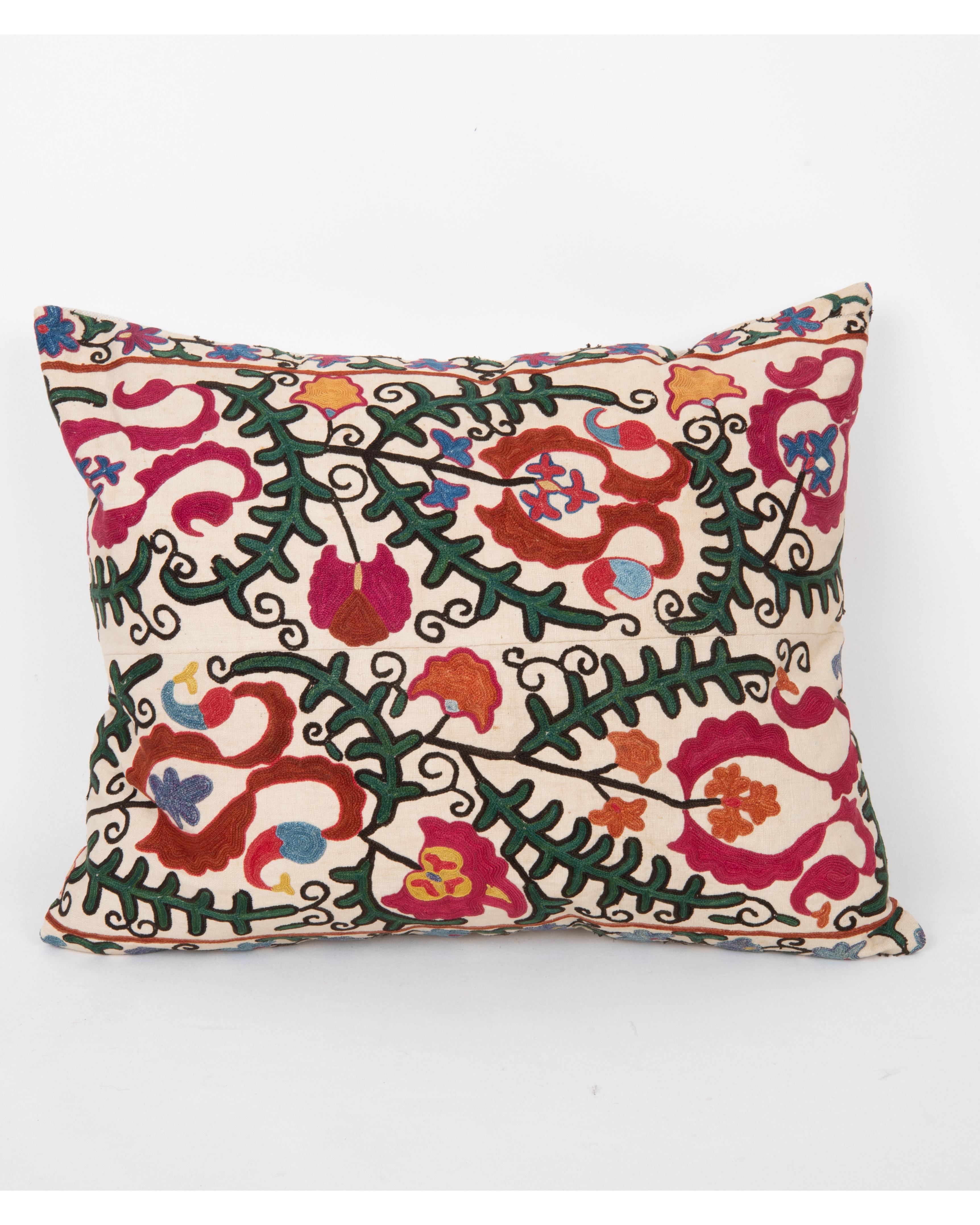 It does not come with an insert.
Linen in the back.
Zipper Closure.
Dry Cleaning recommended.



This  pillow is fashioned from a late 19th -century suzani originating from Bukhara, Uzbekistan—an important Silk Road city celebrated for its masterful
