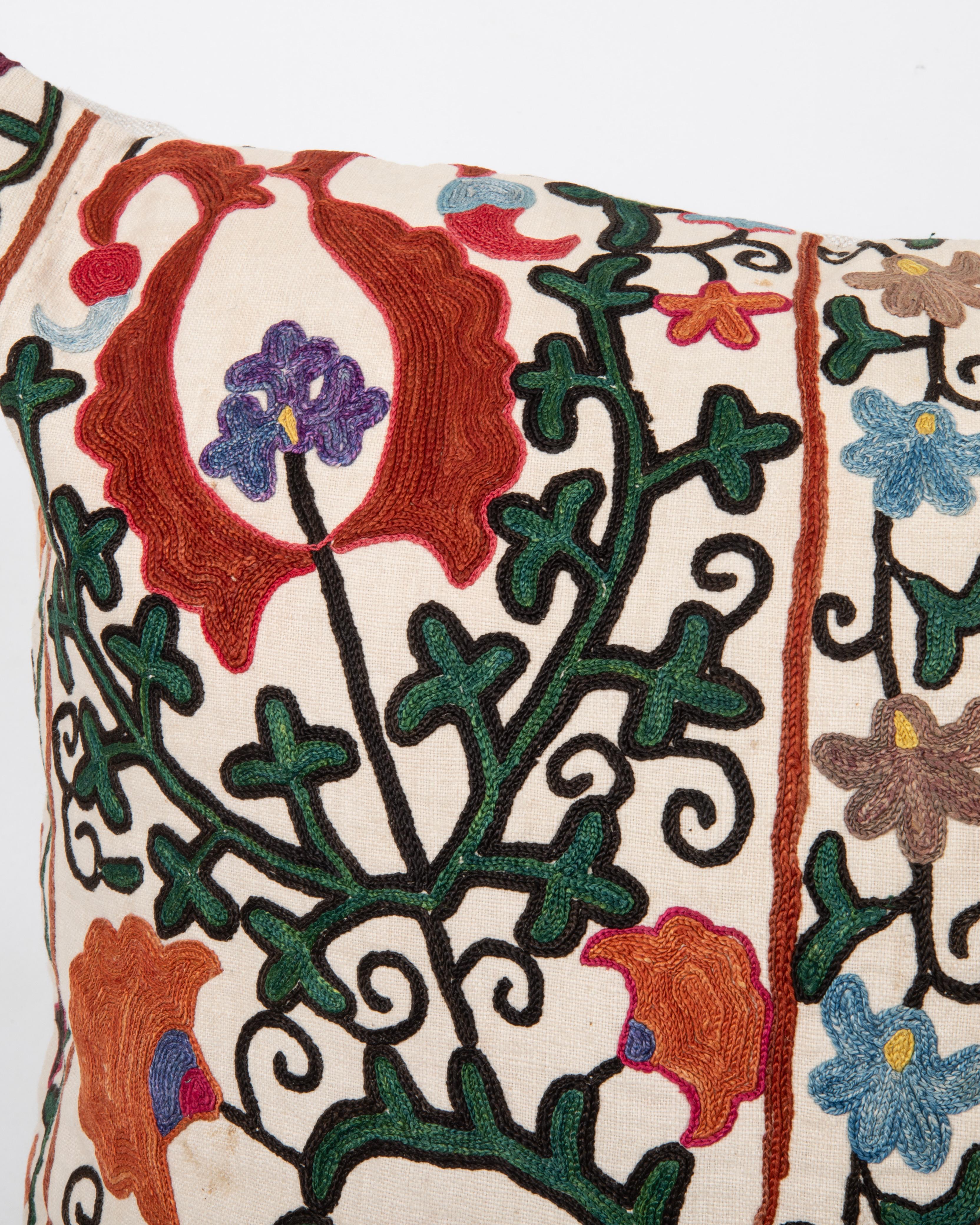 Uzbek Antique Suzani Pillow Made from a 19th C. Bukhara suzani For Sale