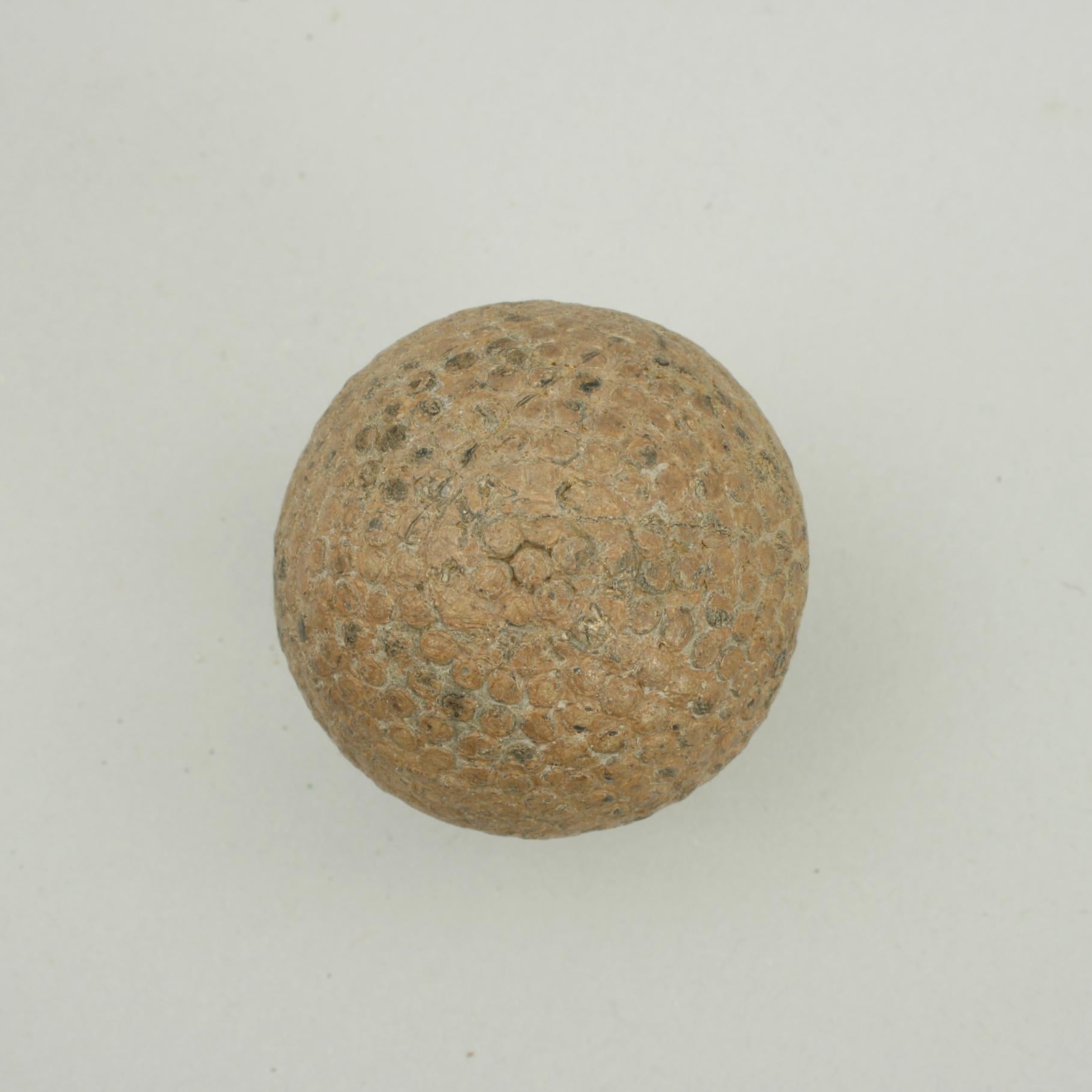 'S.Vale Hawk' Bramble Golf Ball.
A good example of a ' Springvale Hawk' bramble patterned rubber core golf ball. The golf ball is in fair condition and is manufactured by Hutchison Main & Co., Glasgow Scotland. The ball is marked 'S. Vale Hawk' on