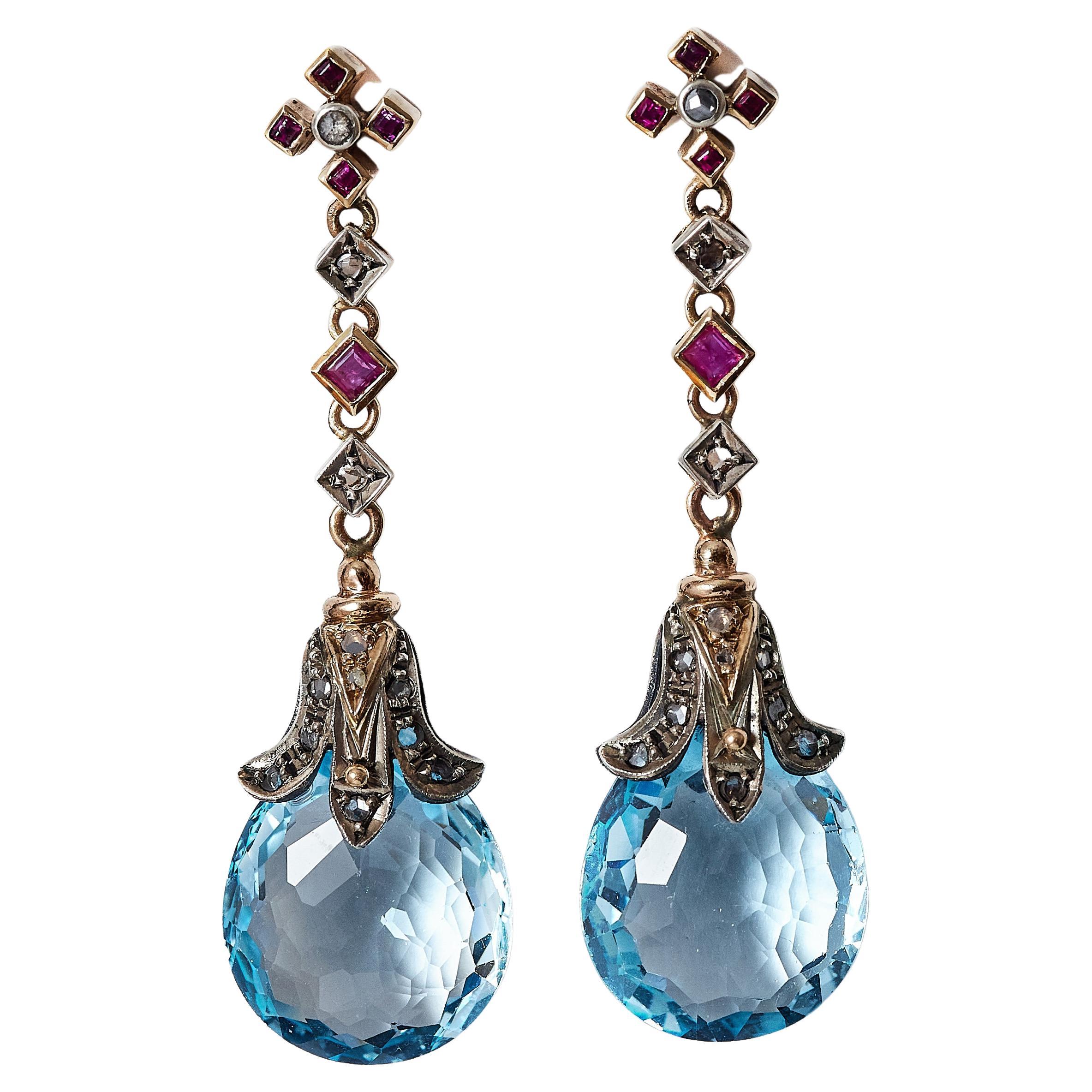 Antique Arts and Craft topaz, rubies, diamond earings, made circa 1900.