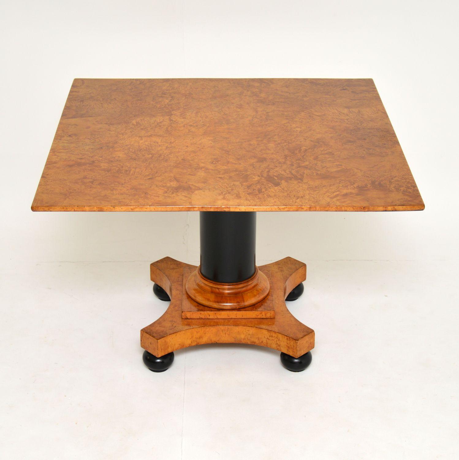 A stunning antique coffee / occasional table, this was made in Sweden and dates from around the 1840’s period. It is beautifully made from burr birch and ebonised solid wood.

The square top is large and has the most exquisite colour and grain