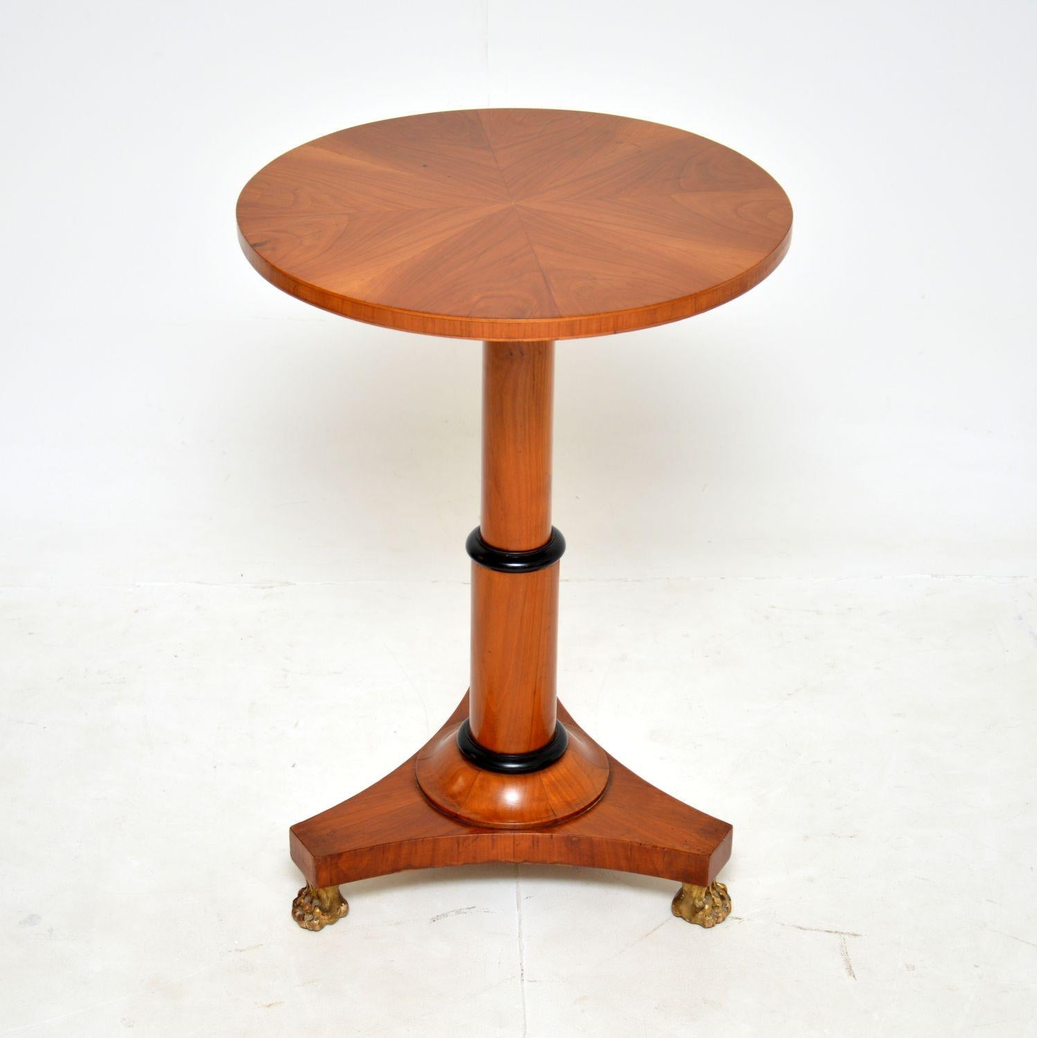 A stunning antique Swedish Biedermeier period occasional table in satin birch. This was made in Sweden and dates from around 1840-1860.

It is of amazing quality, the top has a segmented starburst veneer pattern. This sits on a baluster support with