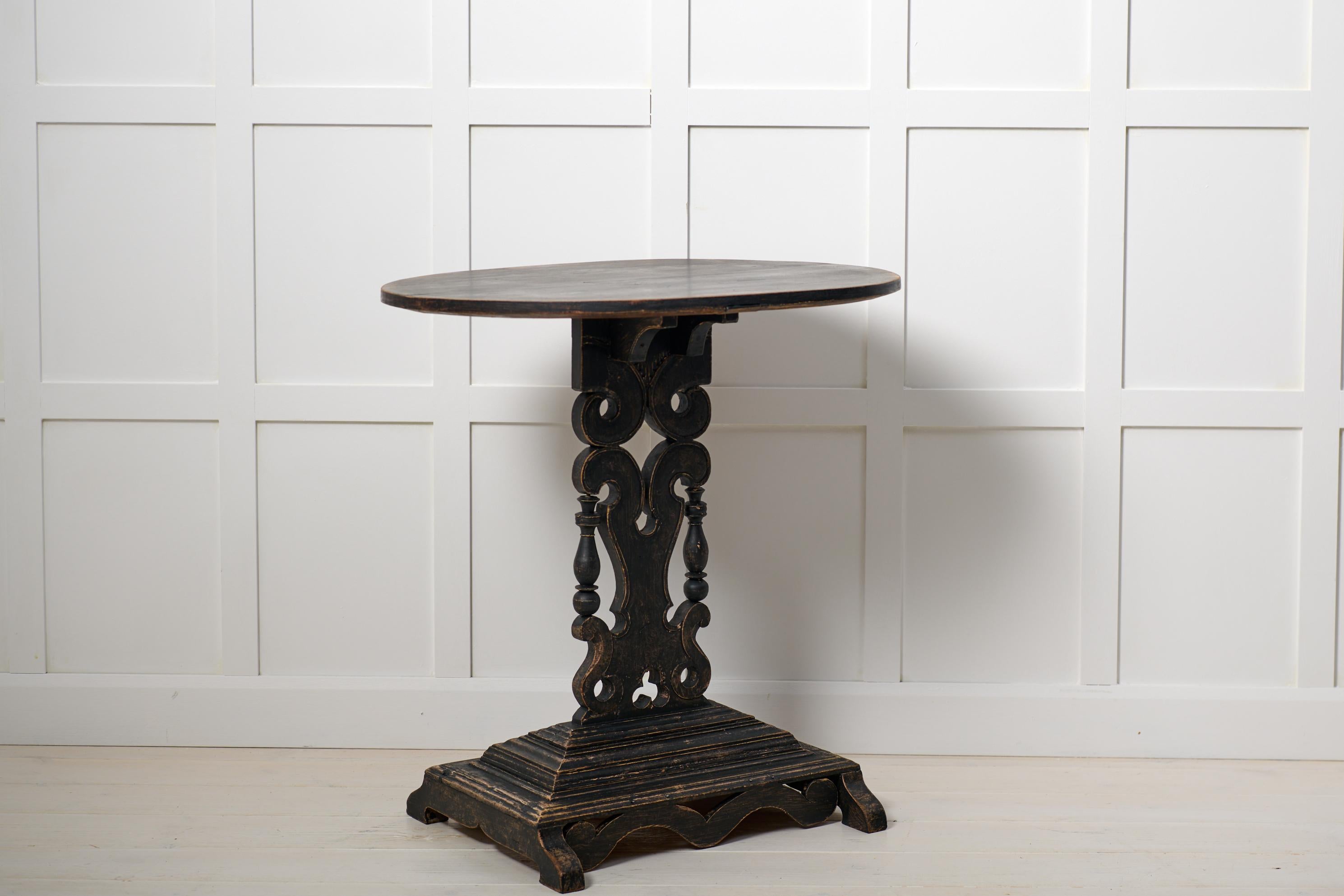 Antique Swedish Center Table, Distressed Black Paint Oval Top and Ornate Base In Good Condition For Sale In Kramfors, SE