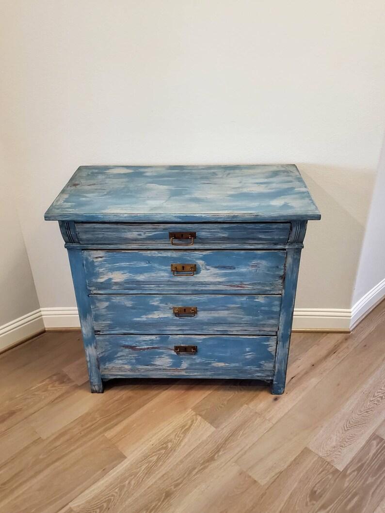 Clean lines and beautiful color, understated simplicity at its best! Renewed, this century old antique chest has been moderately restored, retaining some antique character, delivered deep cleaned, hand waxed and polished, ready for another century