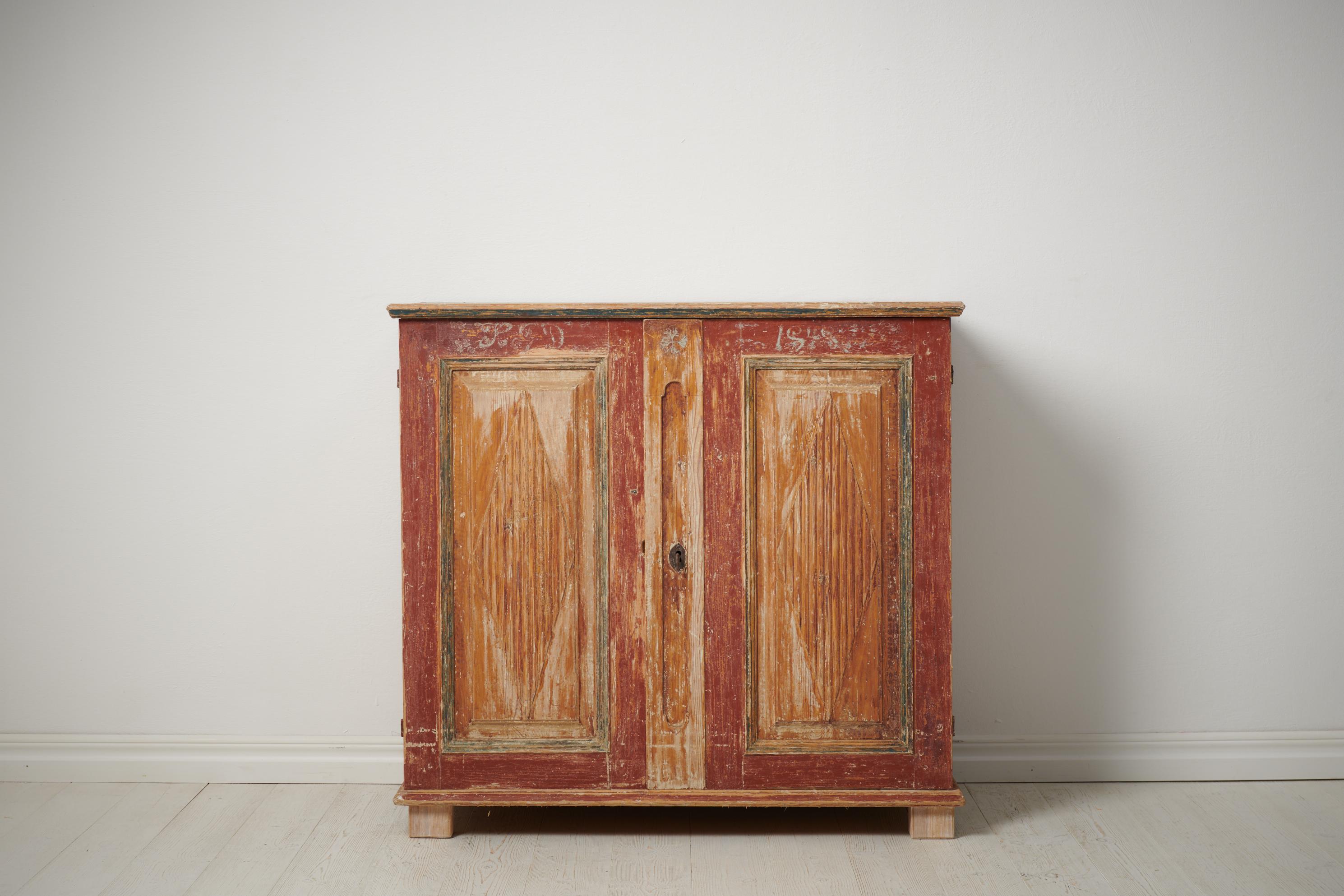 Genuine gustavian Swedish sideboard made by hand in northern Sweden from solid pine. The sideboard has a slightly unusual model as it has fluted panels also on the short sides. This piece is on the smaller side and has elegant proportions, please